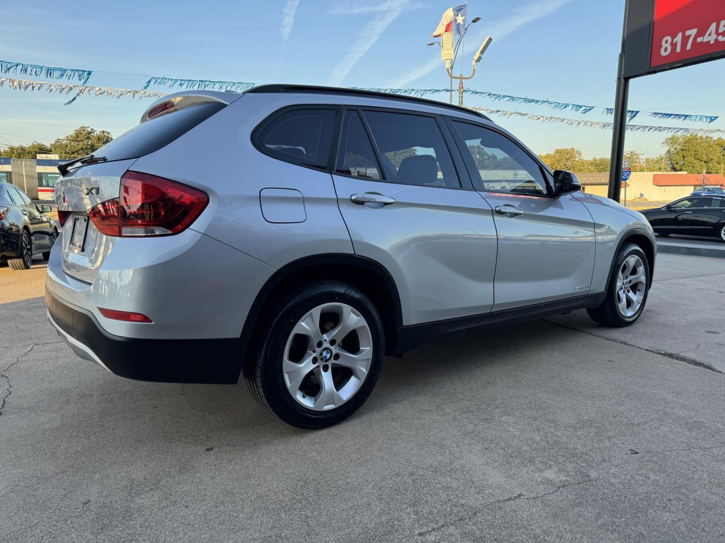 2014 SILVER BMW X1 SDRIVE28I (WBAVM1C52EV) , located at 5900 E. Lancaster Ave., Fort Worth, TX, 76112, (817) 457-5456, 0.000000, 0.000000 - This is a 2014 BMW X1 SDRIVE28I 4 DOOR SUV that is in excellent condition. There are no dents or scratches. The interior is clean with no rips or tears or stains. All power windows, door locks and seats. Ice cold AC for those hot Texas summer days. It is equipped with a CD player, AM/FM radio, AUX p - Photo#4