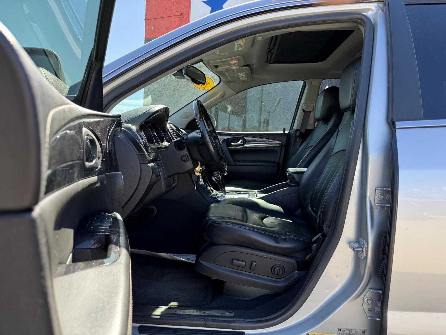 2015 SILVER BUICK ENCLAVE PREMIUM (5GAKRCKD2FJ) , located at 5900 E. Lancaster Ave., Fort Worth, TX, 76112, (817) 457-5456, 0.000000, 0.000000 - This is a 2015 BUICK ENCLAVE PREMIUM 4 DOOR SUV that is in excellent condition. There are no dents or scratches. The interior is clean with no rips or tears or stains. All power windows, door locks and seats. Ice cold AC for those hot Texas summer days. It is equipped with a CD player, AM/FM radio, - Photo#8