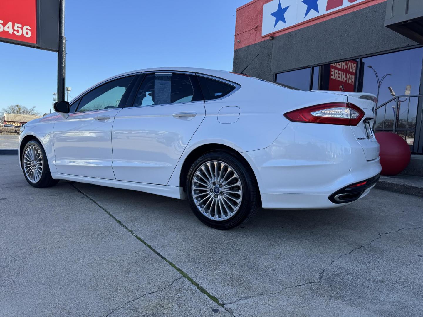 2016 WHITE FORD FUSION TITANIUM (3FA6P0K95GR) , located at 5900 E. Lancaster Ave., Fort Worth, TX, 76112, (817) 457-5456, 0.000000, 0.000000 - This is a 2016 FORD FUSION TITANIUM 4 DOOR SEDAN that is in excellent condition. There are no dents or scratches. The interior is clean with no rips or tears or stains. All power windows, door locks and seats. Ice cold AC for those hot Texas summer days. It is equipped with a CD player, AM/FM radio, - Photo#6