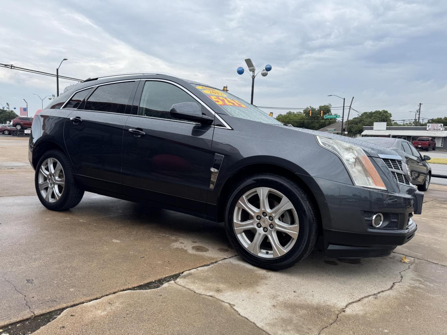 2012 GRAY CADILLAC SRX PERFORMANCE (3GYFNBE34CS) , located at 5900 E. Lancaster Ave., Fort Worth, TX, 76112, (817) 457-5456, 0.000000, 0.000000 - This is a 2012 CADILLAC SRX PERFORMANCE 4 DOOR SUV that is in excellent condition. There are no dents or scratches. The interior is clean with no rips or tears or stains. All power windows, door locks and seats. Ice cold AC for those hot Texas summer days. It is equipped with a CD player, AM/FM radi - Photo#2