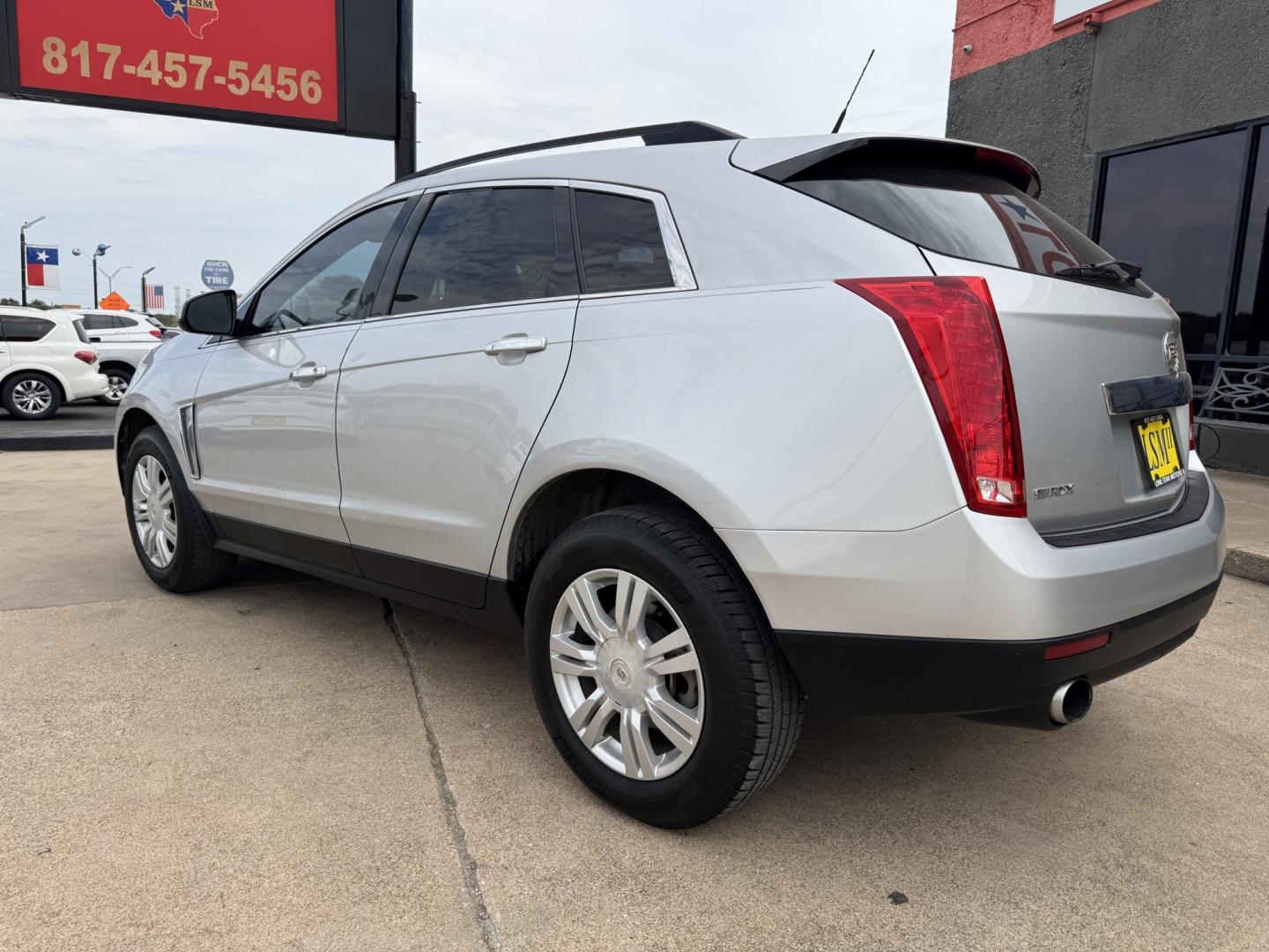 2013 SILVER CADILLAC SRX BASE (3GYFNAE39DS) , located at 5900 E. Lancaster Ave., Fort Worth, TX, 76112, (817) 457-5456, 0.000000, 0.000000 - This is a 2013 CADILLAC SRX BASE 4 DOOR SUV that is in excellent condition. There are no dents or scratches. The interior is clean with no rips or tears or stains. All power windows, door locks and seats. Ice cold AC for those hot Texas summer days. It is equipped with a CD player, AM/FM radio, AUX- Photo#6