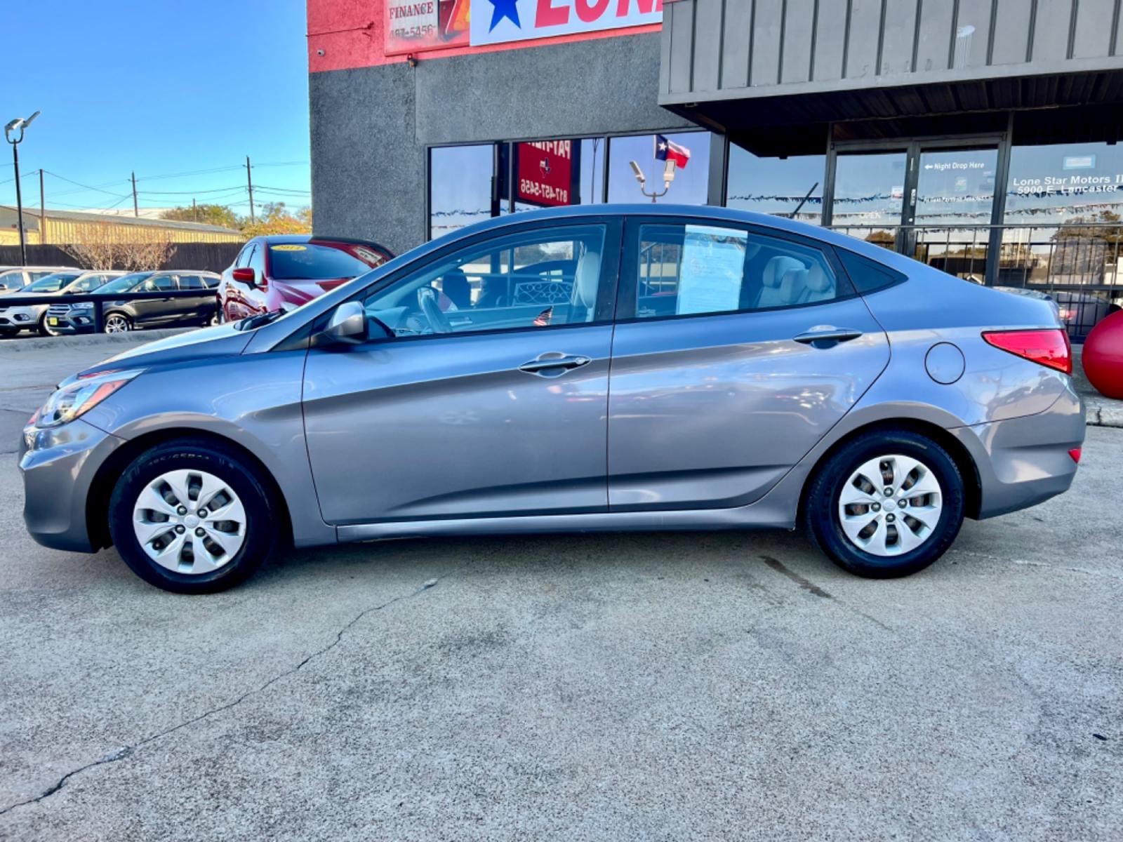 2016 GRAY /Gray HYUNDAI ACCENT SE SE 4dr Sedan 6A (KMHCT4AE3GU) with an 1.6L I4 engine, Automatic 6-Speed transmission, located at 5900 E. Lancaster Ave., Fort Worth, TX, 76112, (817) 457-5456, 0.000000, 0.000000 - This is a 2016 Hyundai Accent SE 4dr Sedan 6A that is in excellent condition. There are no dents or scratches. The interior is clean with no rips or tears or stains. All power windows, door locks and seats. Ice cold AC for those hot Texas summer days. It is equipped with a CD player, AM/FM radio, AU - Photo #2