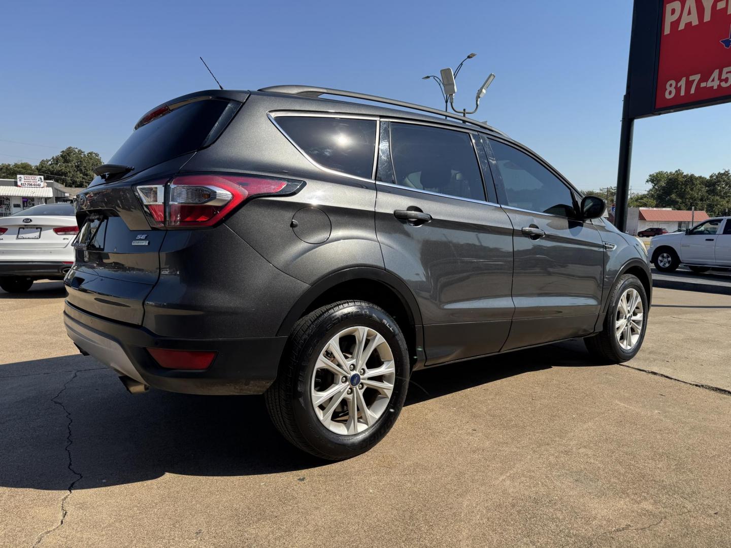 2018 GRAY /BLACK FORD ESCAPE SE (1FMCU0GD2JU) , located at 5900 E. Lancaster Ave., Fort Worth, TX, 76112, (817) 457-5456, 0.000000, 0.000000 - Photo#3