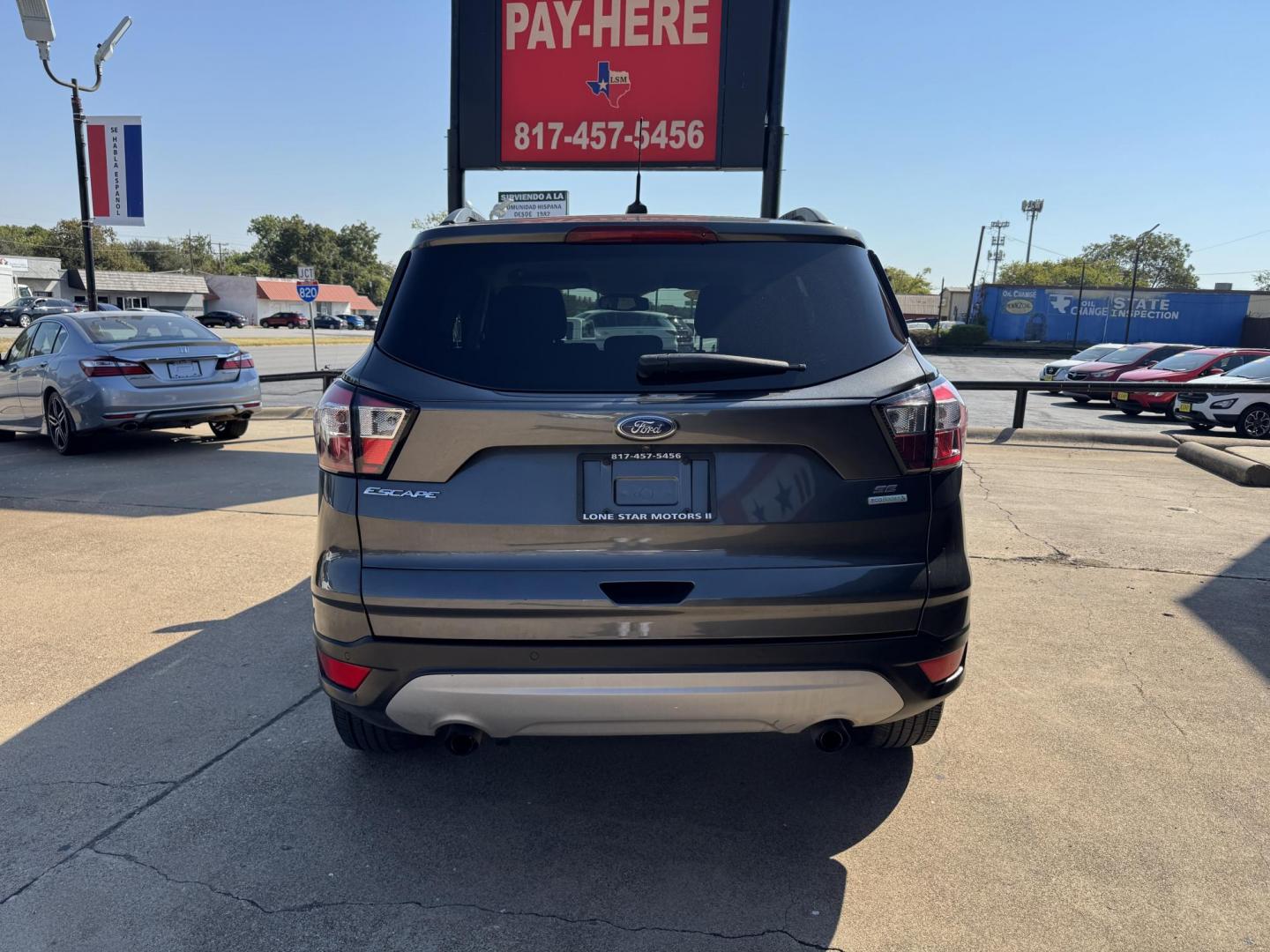 2018 GRAY /BLACK FORD ESCAPE SE (1FMCU0GD2JU) , located at 5900 E. Lancaster Ave., Fort Worth, TX, 76112, (817) 457-5456, 0.000000, 0.000000 - Photo#4