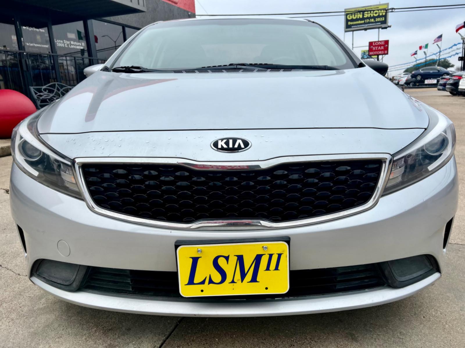2018 GRAY KIA FORTE LX (3KPFK4A74JE) , located at 5900 E. Lancaster Ave., Fort Worth, TX, 76112, (817) 457-5456, 0.000000, 0.000000 - This is a 2018 KIA FORTE LX 4 DR SEDAN that is in excellent condition. The interior is clean with no rips or tears or stains. All power windows, door locks and seats. Ice cold AC for those hot Texas summer days. It is equipped with a CD player, AM/FM radio, AUX port, Bluetooth connectivity and Siriu - Photo #1