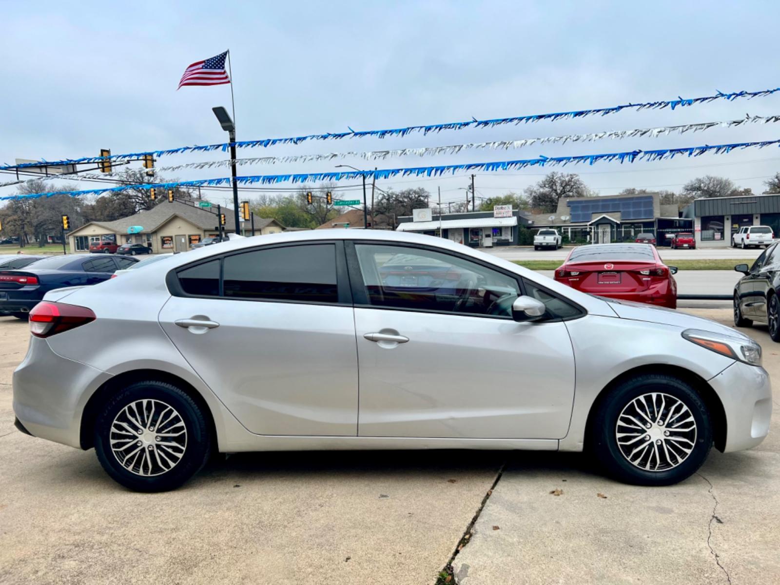 2018 GRAY KIA FORTE LX (3KPFK4A74JE) , located at 5900 E. Lancaster Ave., Fort Worth, TX, 76112, (817) 457-5456, 0.000000, 0.000000 - This is a 2018 KIA FORTE LX 4 DR SEDAN that is in excellent condition. The interior is clean with no rips or tears or stains. All power windows, door locks and seats. Ice cold AC for those hot Texas summer days. It is equipped with a CD player, AM/FM radio, AUX port, Bluetooth connectivity and Siriu - Photo #6