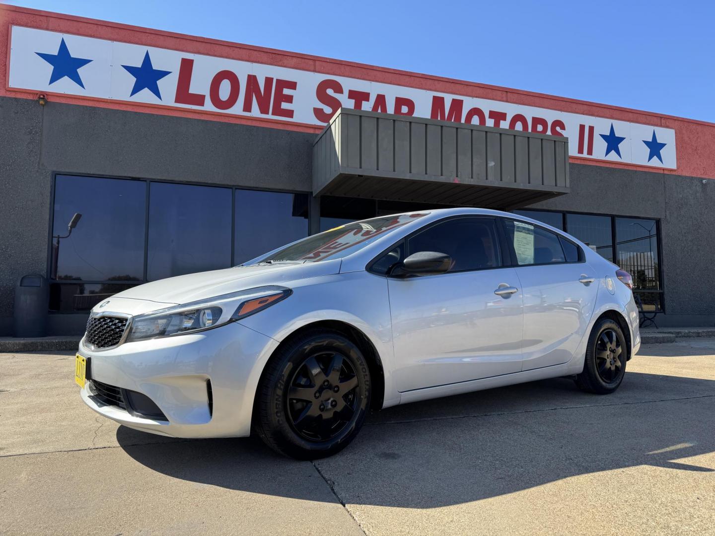 2018 GRAY KIA FORTE LX (3KPFK4A74JE) , located at 5900 E. Lancaster Ave., Fort Worth, TX, 76112, (817) 457-5456, 0.000000, 0.000000 - This is a 2018 KIA FORTE LX 4 DR SEDAN that is in excellent condition. The interior is clean with no rips or tears or stains. All power windows, door locks and seats. Ice cold AC for those hot Texas summer days. It is equipped with a CD player, AM/FM radio, AUX port, Bluetooth connectivity and Siriu - Photo#0