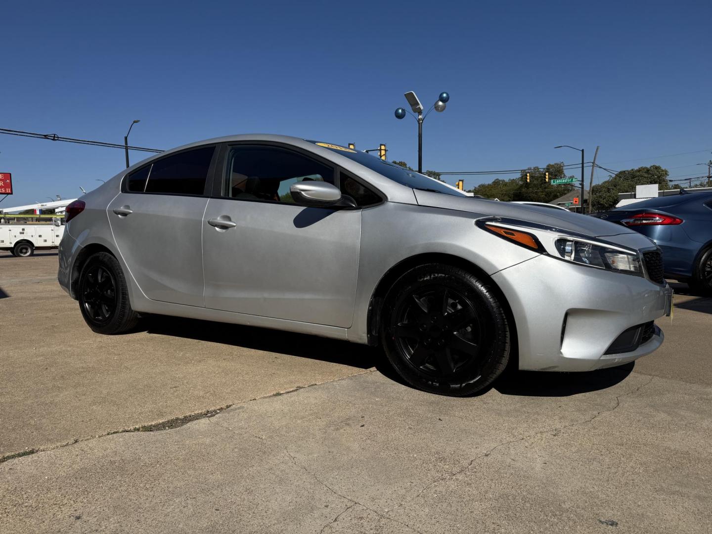 2018 GRAY KIA FORTE LX (3KPFK4A74JE) , located at 5900 E. Lancaster Ave., Fort Worth, TX, 76112, (817) 457-5456, 0.000000, 0.000000 - This is a 2018 KIA FORTE LX 4 DR SEDAN that is in excellent condition. The interior is clean with no rips or tears or stains. All power windows, door locks and seats. Ice cold AC for those hot Texas summer days. It is equipped with a CD player, AM/FM radio, AUX port, Bluetooth connectivity and Siriu - Photo#2