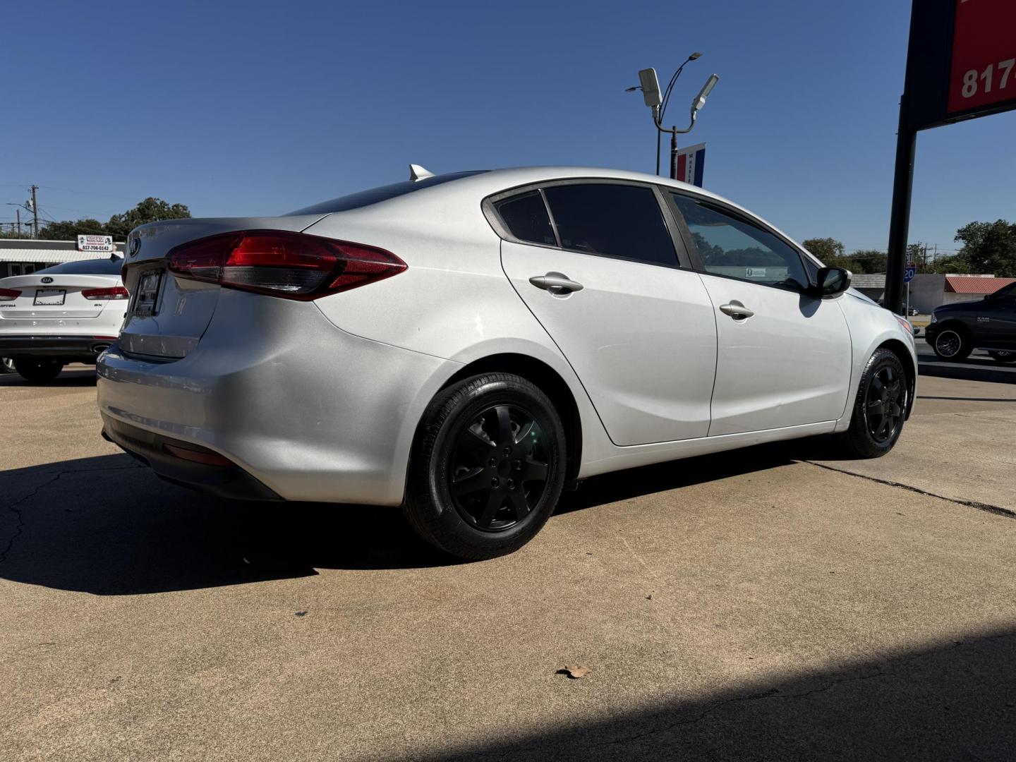 2018 GRAY KIA FORTE LX (3KPFK4A74JE) , located at 5900 E. Lancaster Ave., Fort Worth, TX, 76112, (817) 457-5456, 0.000000, 0.000000 - This is a 2018 KIA FORTE LX 4 DR SEDAN that is in excellent condition. The interior is clean with no rips or tears or stains. All power windows, door locks and seats. Ice cold AC for those hot Texas summer days. It is equipped with a CD player, AM/FM radio, AUX port, Bluetooth connectivity and Siriu - Photo#3