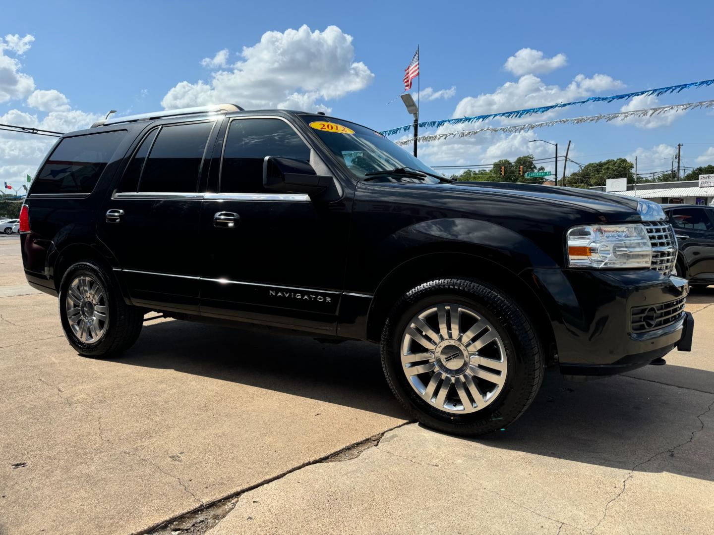 2012 BLACK LINCOLN NAVIGATOR PREMIUM; L (5LMJJ2H51CE) , located at 5900 E. Lancaster Ave., Fort Worth, TX, 76112, (817) 457-5456, 0.000000, 0.000000 - Photo#2