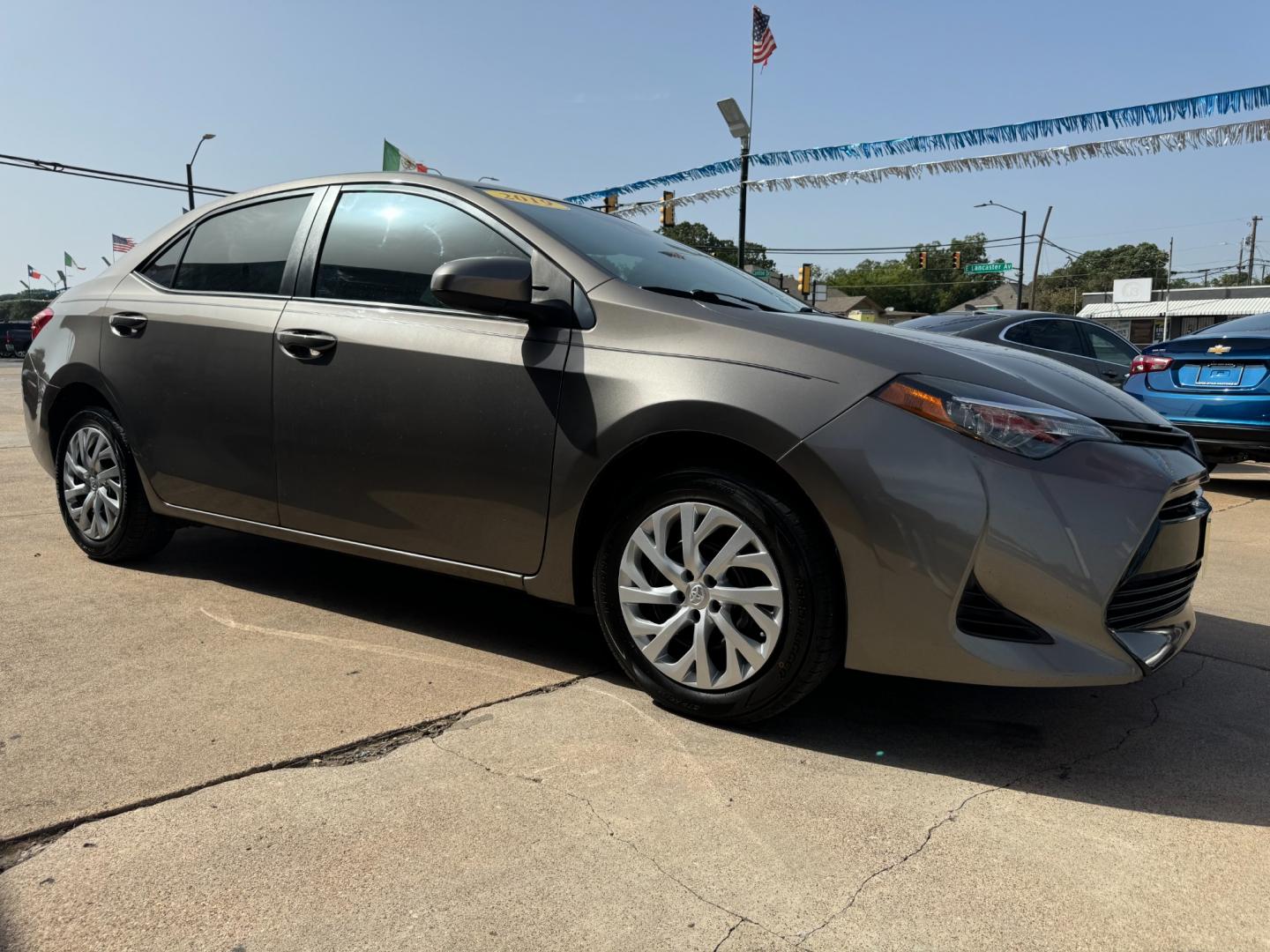 2019 GOLD TOYOTA COROLLA SE; LE; XLE; (5YFBURHE5KP) , located at 5900 E. Lancaster Ave., Fort Worth, TX, 76112, (817) 457-5456, 0.000000, 0.000000 - Photo#3