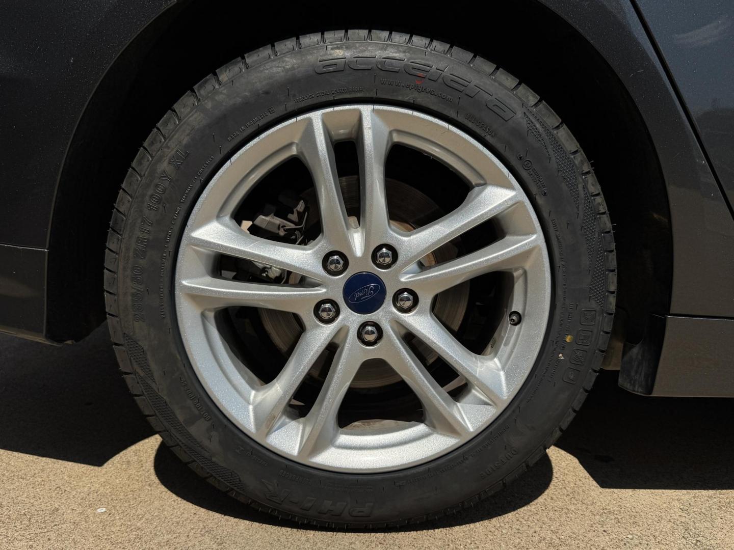 2018 SILVER /TAN FORD FUSION SE SE (3FA6P0HD6JR) with an 1.5L engine, 6-Speed Automatic transmission, located at 5900 E. Lancaster Ave., Fort Worth, TX, 76112, (817) 457-5456, 0.000000, 0.000000 - 2018 Ford Fusion SE for Sale in Fort Worth, TX – This stylish sedan combines fuel efficiency with comfort, offering up to 32 MPG highway, a smooth 6-speed automatic transmission, and seating for five. Equipped with Bluetooth, a rearview camera, and alloy wheels, the Fusion SE delivers both conveni - Photo#21