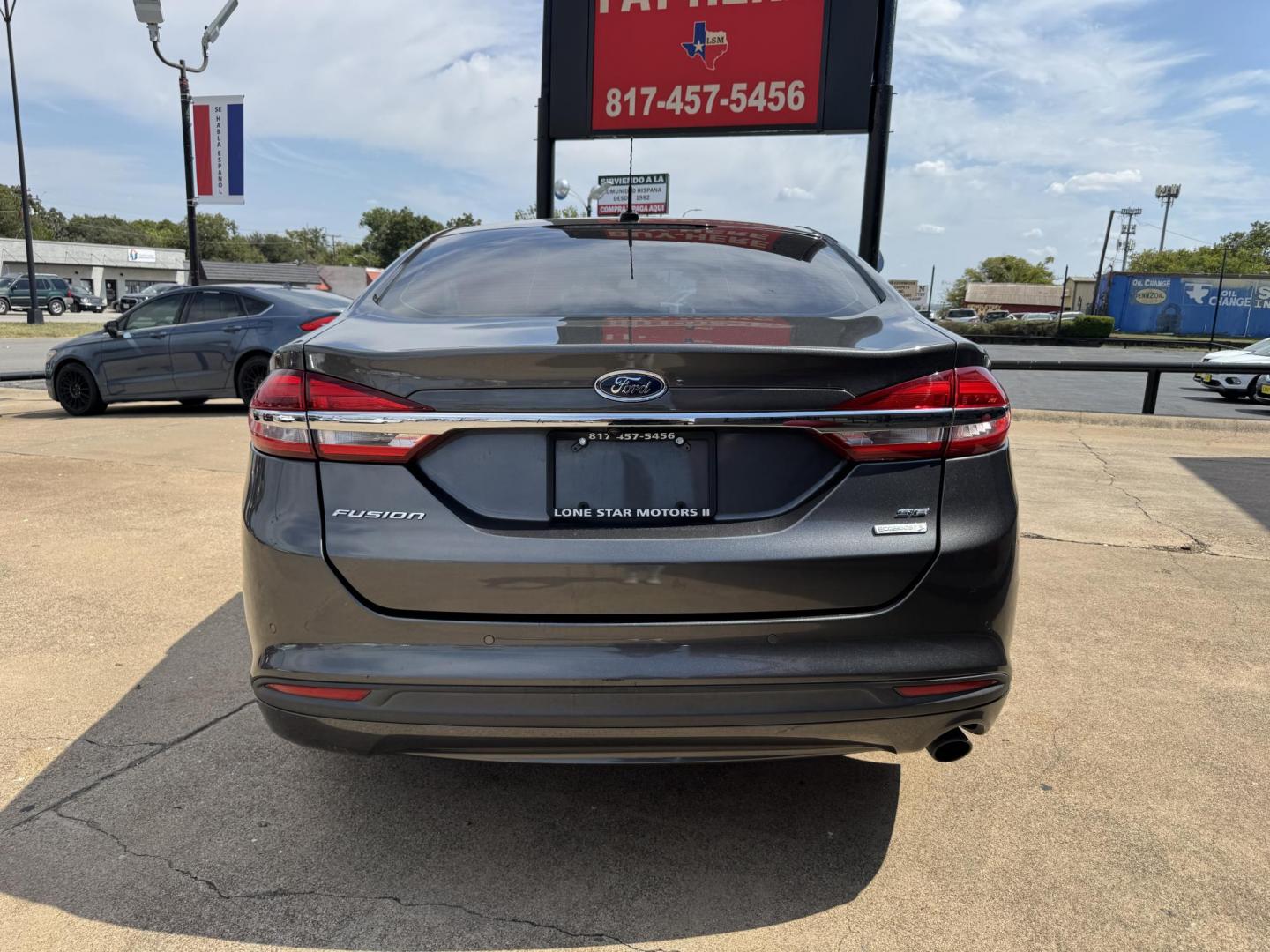 2018 SILVER /TAN FORD FUSION SE SE (3FA6P0HD6JR) with an 1.5L engine, 6-Speed Automatic transmission, located at 5900 E. Lancaster Ave., Fort Worth, TX, 76112, (817) 457-5456, 0.000000, 0.000000 - 2018 Ford Fusion SE for Sale in Fort Worth, TX – This stylish sedan combines fuel efficiency with comfort, offering up to 32 MPG highway, a smooth 6-speed automatic transmission, and seating for five. Equipped with Bluetooth, a rearview camera, and alloy wheels, the Fusion SE delivers both conveni - Photo#4