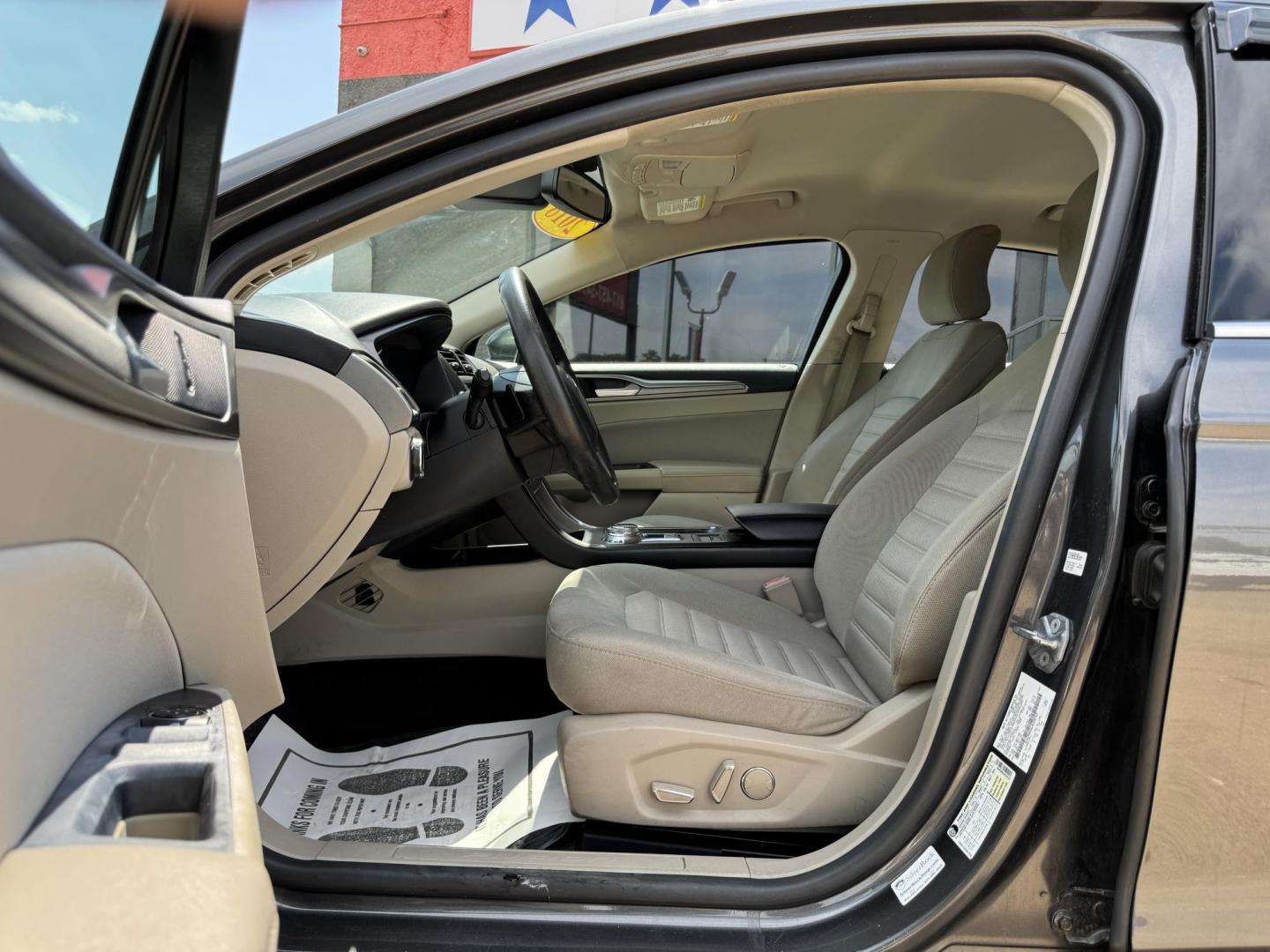 2018 SILVER /TAN FORD FUSION SE SE (3FA6P0HD6JR) with an 1.5L engine, 6-Speed Automatic transmission, located at 5900 E. Lancaster Ave., Fort Worth, TX, 76112, (817) 457-5456, 0.000000, 0.000000 - 2018 Ford Fusion SE for Sale in Fort Worth, TX – This stylish sedan combines fuel efficiency with comfort, offering up to 32 MPG highway, a smooth 6-speed automatic transmission, and seating for five. Equipped with Bluetooth, a rearview camera, and alloy wheels, the Fusion SE delivers both conveni - Photo#8