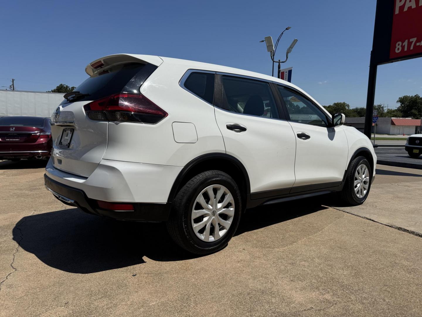 2019 WHITE /BLACK NISSAN ROGUE S; SL; SV S 2WD (KNMAT2MT1KP) with an 2.5L engine, CVT transmission, located at 5900 E. Lancaster Ave., Fort Worth, TX, 76112, (817) 457-5456, 0.000000, 0.000000 - Looking for a fuel-efficient, reliable compact SUV? The 2019 Nissan Rogue S comes with a 2.5L 4-cylinder engine and CVT automatic transmission, making it perfect for city and highway driving. Seats 5 passengers comfortably with charcoal cloth interior. This front-wheel drive SUV includes essential s - Photo#3