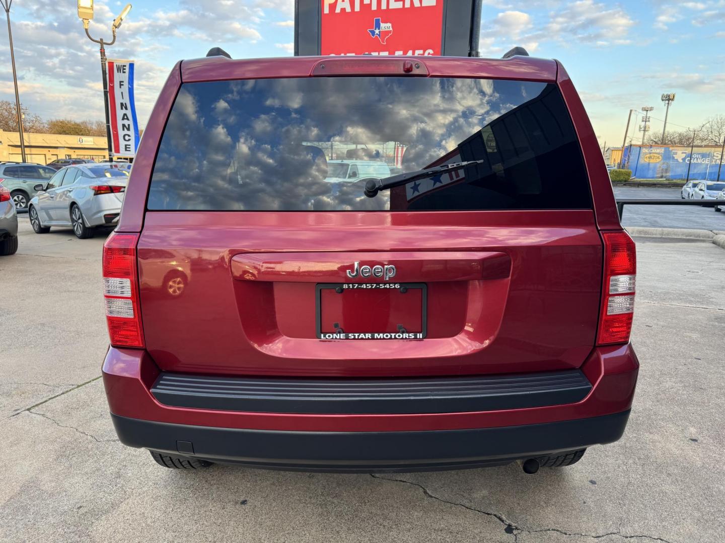 2016 RED JEEP PATRIOT SPORT (1C4NJPBB2GD) , located at 5900 E. Lancaster Ave., Fort Worth, TX, 76112, (817) 457-5456, 0.000000, 0.000000 - Photo#5