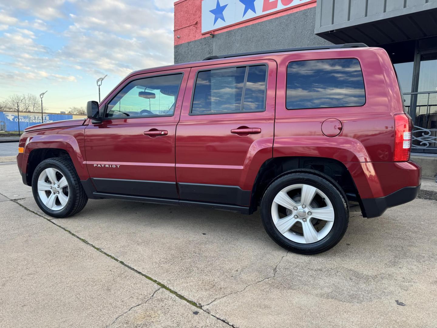 2016 RED JEEP PATRIOT SPORT (1C4NJPBB2GD) , located at 5900 E. Lancaster Ave., Fort Worth, TX, 76112, (817) 457-5456, 0.000000, 0.000000 - Photo#7