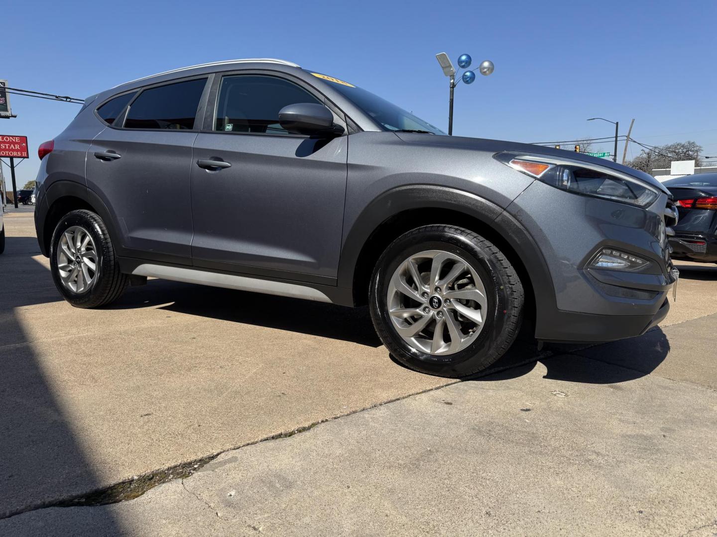 2018 GRAY HYUNDAI TUCSON BASE; SPORT; (KM8J33A43JU) , located at 5900 E. Lancaster Ave., Fort Worth, TX, 76112, (817) 457-5456, 0.000000, 0.000000 - Photo#2