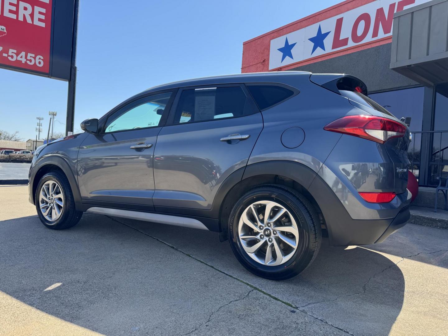 2018 GRAY HYUNDAI TUCSON BASE; SPORT; (KM8J33A43JU) , located at 5900 E. Lancaster Ave., Fort Worth, TX, 76112, (817) 457-5456, 0.000000, 0.000000 - Photo#6