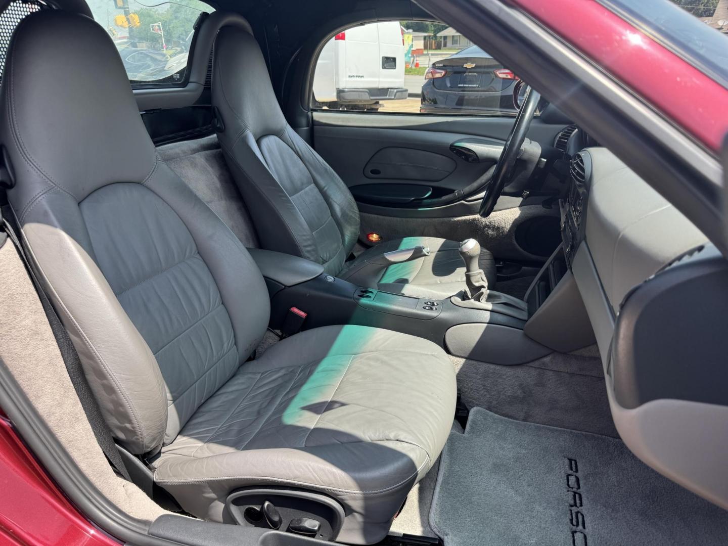 1998 Burgundy /Gray Porsche Boxster Base (WP0CA2989WU) with an 2.5L H6 DOHC 24V engine, 5-Speed Manual Overdrive transmission, located at 5900 E. Lancaster Ave., Fort Worth, TX, 76112, (817) 457-5456, 0.000000, 0.000000 - Immaculate 1998 Porsche Boxster | 5-Speed Manual | 36K Original Miles Includes factory hardtop, carriage, cover & custom satchel. Collector-grade condition – rare find, ready to turn heads. 2 Owner Vehicle Carfax available Garage Kept - Photo#16
