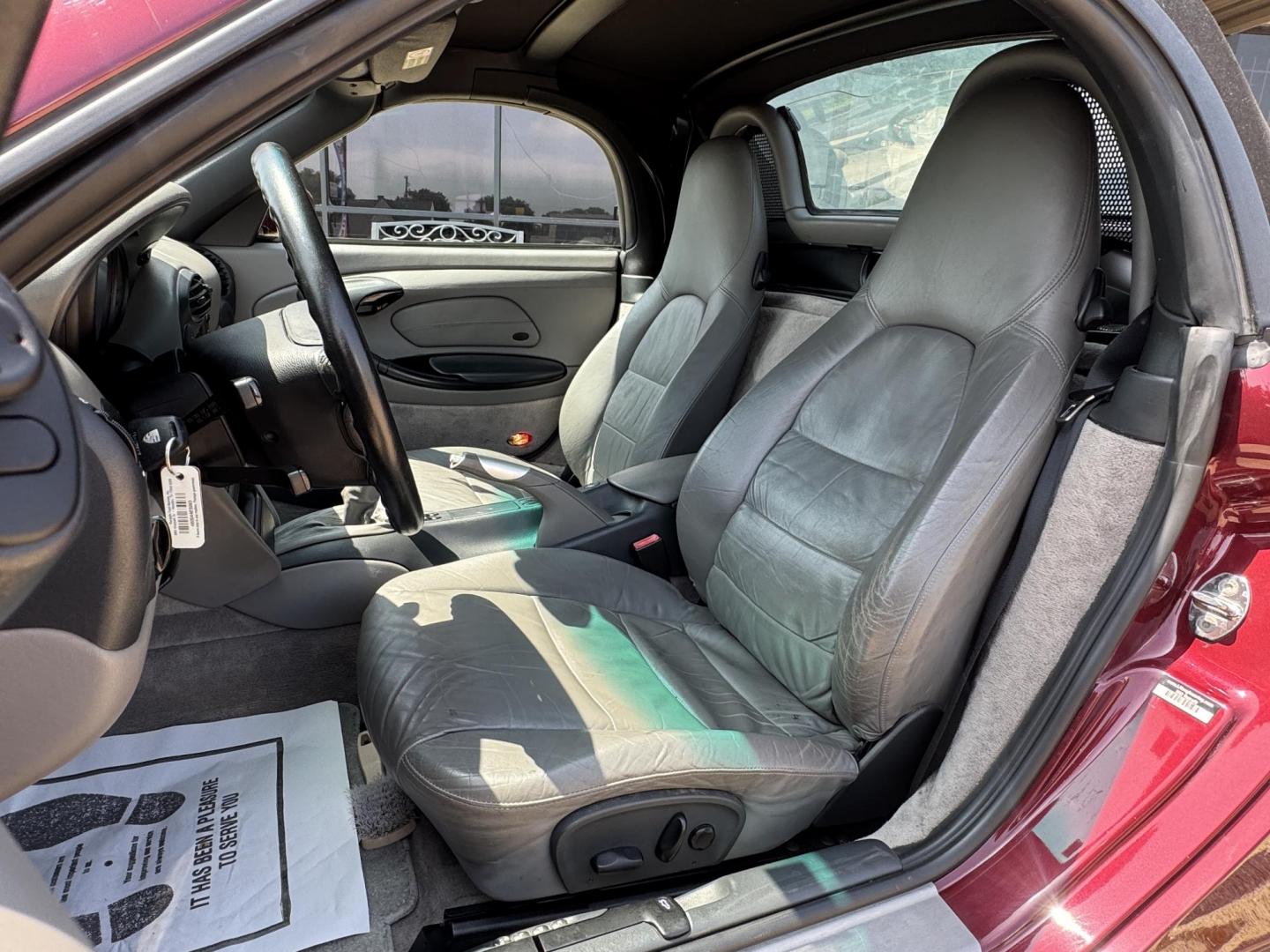 1998 Burgundy /Gray Porsche Boxster Base (WP0CA2989WU) with an 2.5L H6 DOHC 24V engine, 5-Speed Manual Overdrive transmission, located at 5900 E. Lancaster Ave., Fort Worth, TX, 76112, (817) 457-5456, 0.000000, 0.000000 - Immaculate 1998 Porsche Boxster | 5-Speed Manual | 36K Original Miles Includes factory hardtop, carriage, cover & custom satchel. Collector-grade condition – rare find, ready to turn heads. 2 Owner Vehicle Carfax available Garage Kept - Photo#13