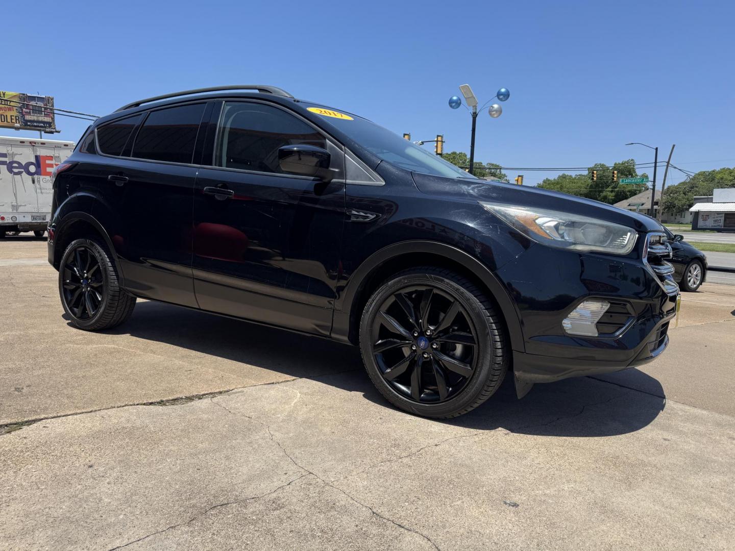 2017 BLACK FORD ESCAPE SE (1FMCU0GD1HU) , located at 5900 E. Lancaster Ave., Fort Worth, TX, 76112, (817) 457-5456, 0.000000, 0.000000 - Photo#2