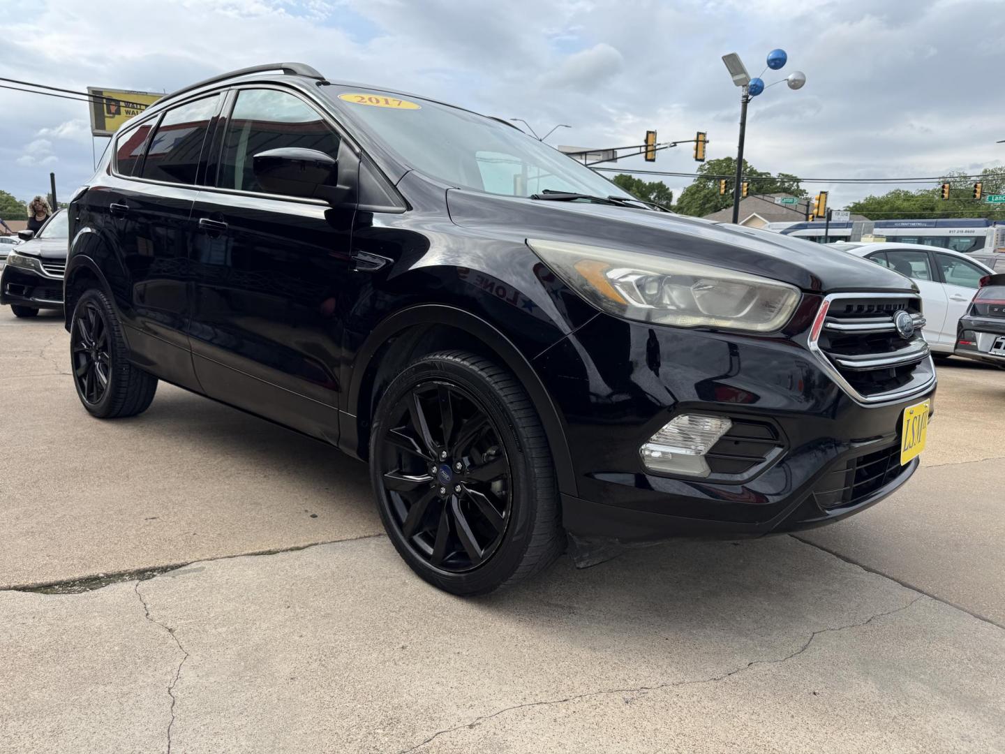 2017 BLACK FORD ESCAPE SE (1FMCU0GD1HU) , located at 5900 E. Lancaster Ave., Fort Worth, TX, 76112, (817) 457-5456, 0.000000, 0.000000 - Photo#2