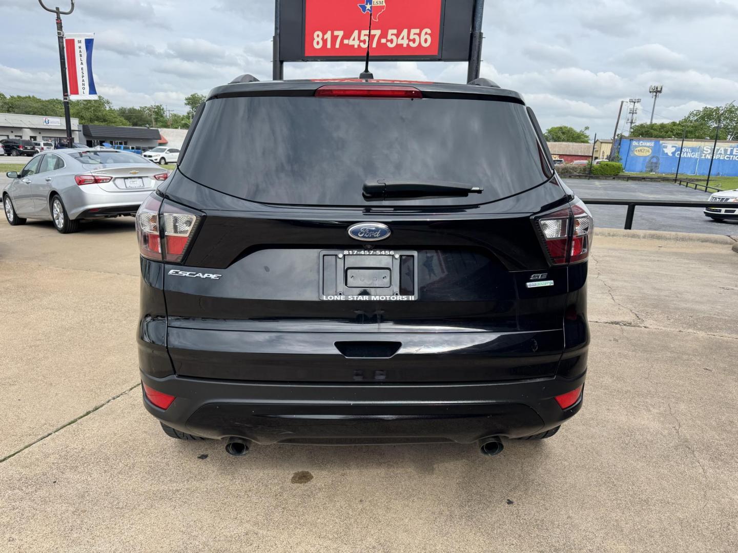 2017 BLACK FORD ESCAPE SE (1FMCU0GD1HU) , located at 5900 E. Lancaster Ave., Fort Worth, TX, 76112, (817) 457-5456, 0.000000, 0.000000 - Photo#4