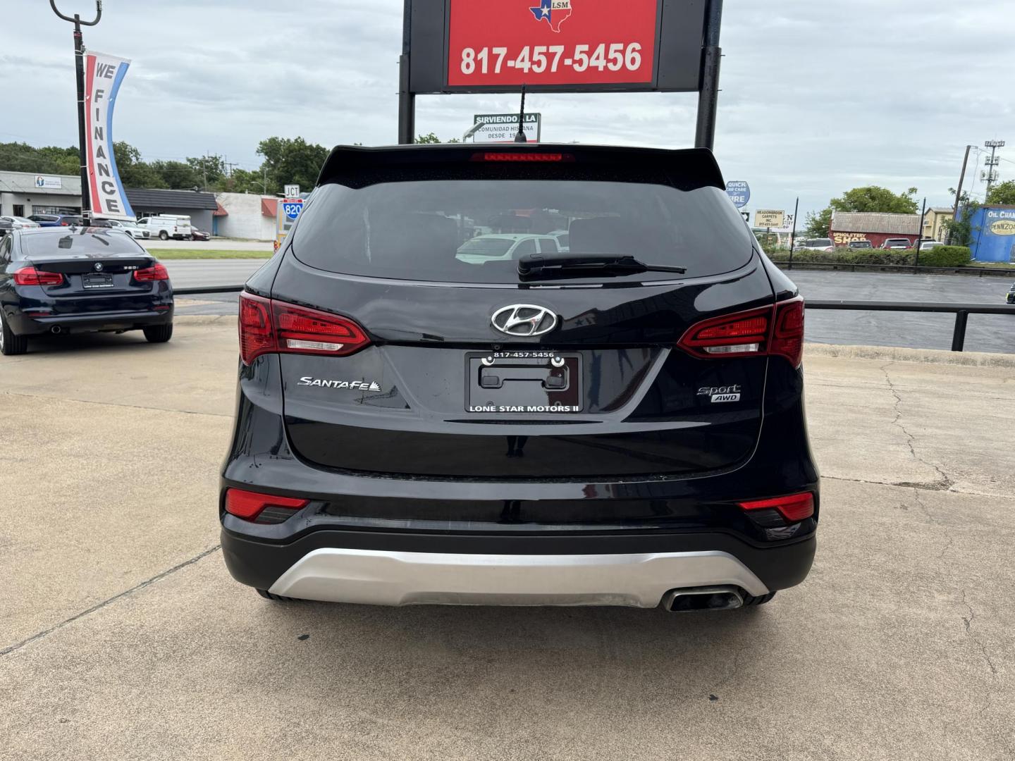 2018 BLACK HYUNDAI SANTA FE SPORT BASE (5NMZTDLB8JH) , located at 5900 E. Lancaster Ave., Fort Worth, TX, 76112, (817) 457-5456, 0.000000, 0.000000 - Photo#4