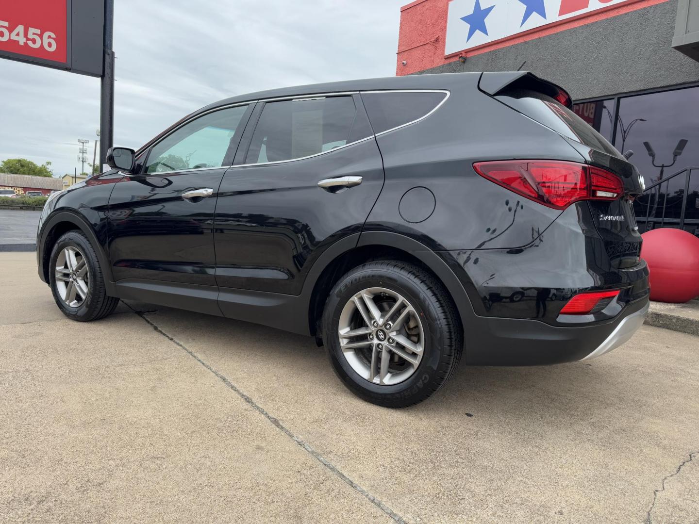 2018 BLACK HYUNDAI SANTA FE SPORT BASE (5NMZTDLB8JH) , located at 5900 E. Lancaster Ave., Fort Worth, TX, 76112, (817) 457-5456, 0.000000, 0.000000 - Photo#6