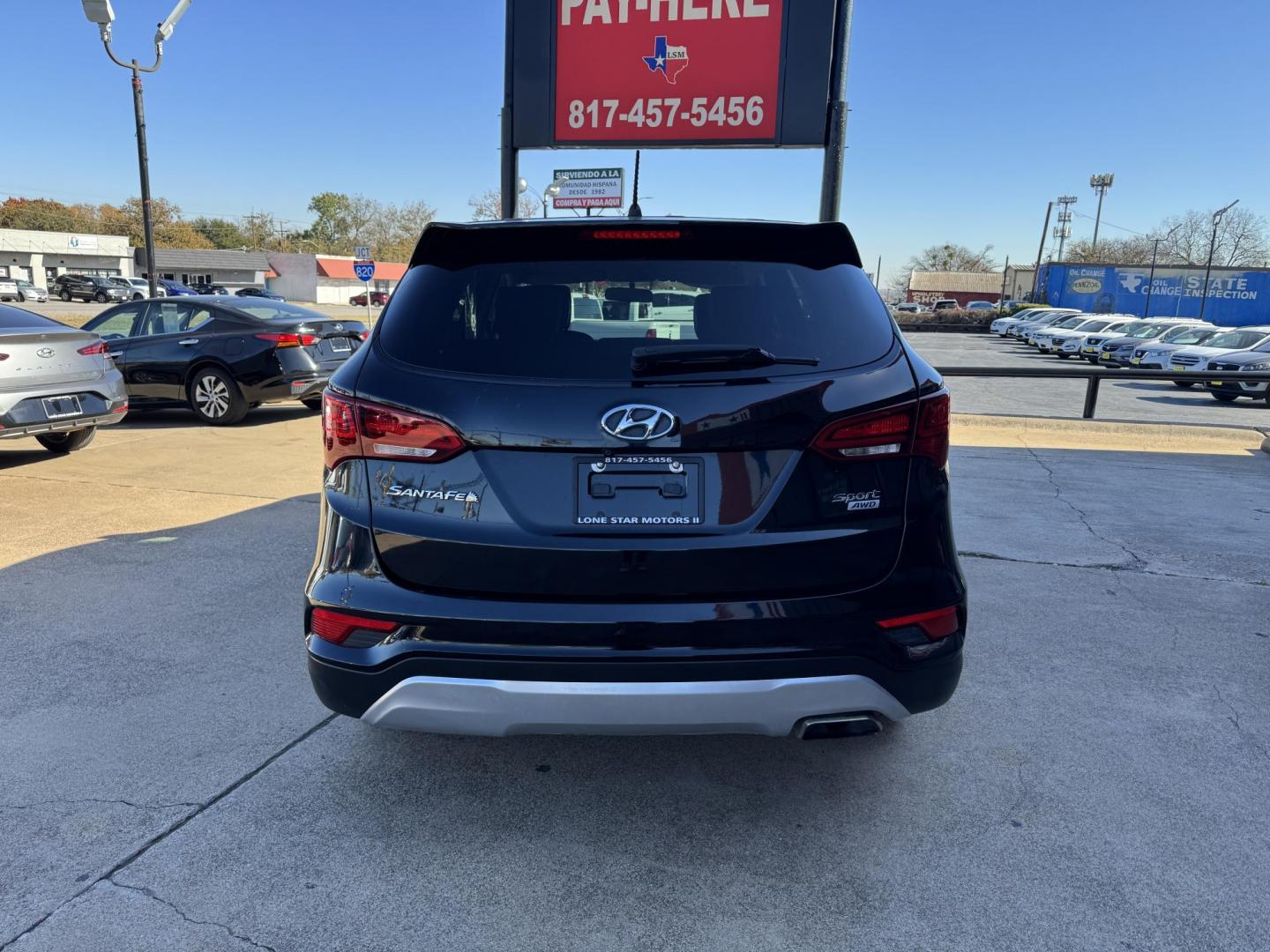 2018 BLACK HYUNDAI SANTA FE SPORT BASE (5NMZTDLB8JH) , located at 5900 E. Lancaster Ave., Fort Worth, TX, 76112, (817) 457-5456, 0.000000, 0.000000 - Photo#4