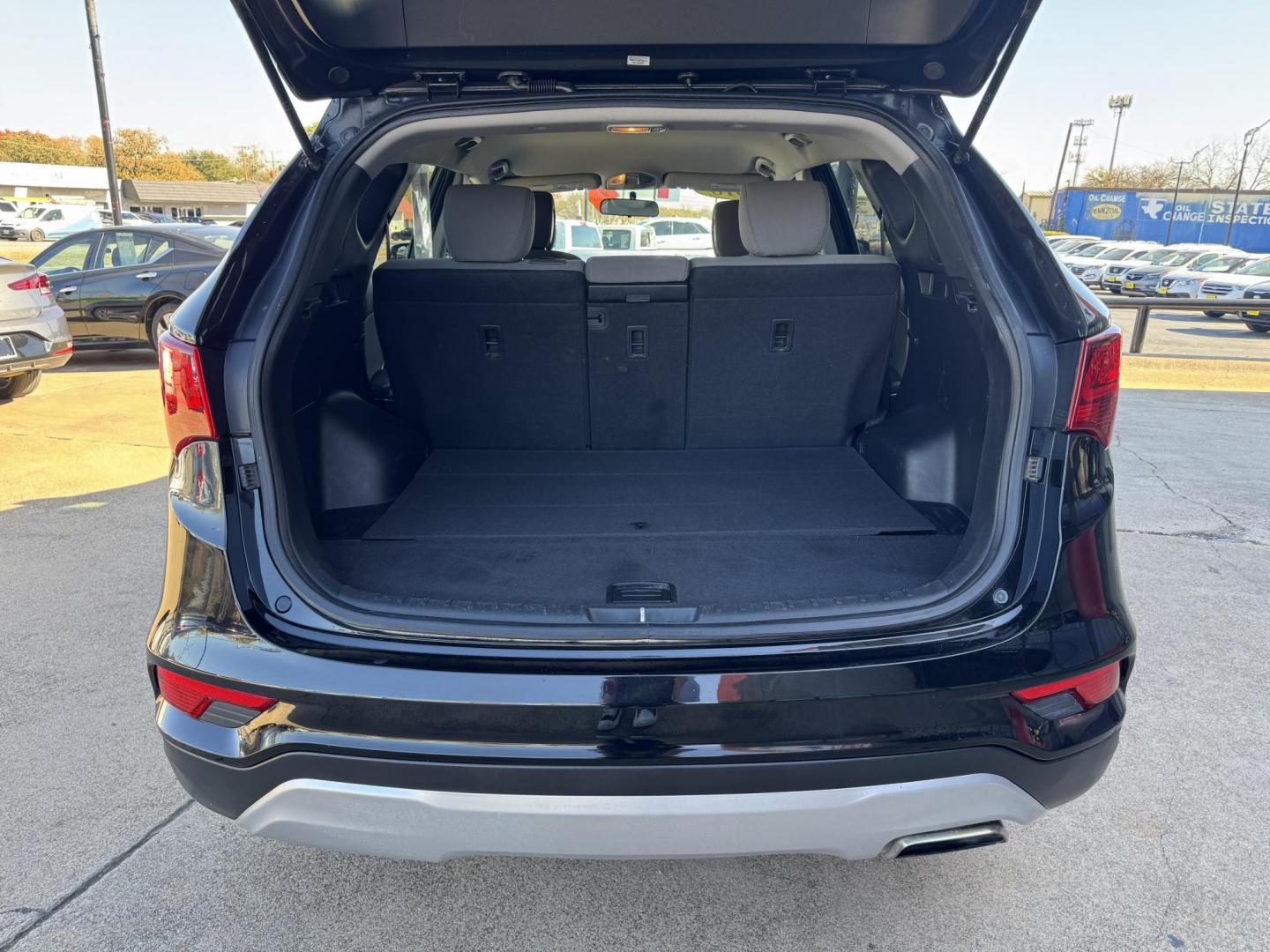 2018 BLACK HYUNDAI SANTA FE SPORT BASE (5NMZTDLB8JH) , located at 5900 E. Lancaster Ave., Fort Worth, TX, 76112, (817) 457-5456, 0.000000, 0.000000 - Photo#5