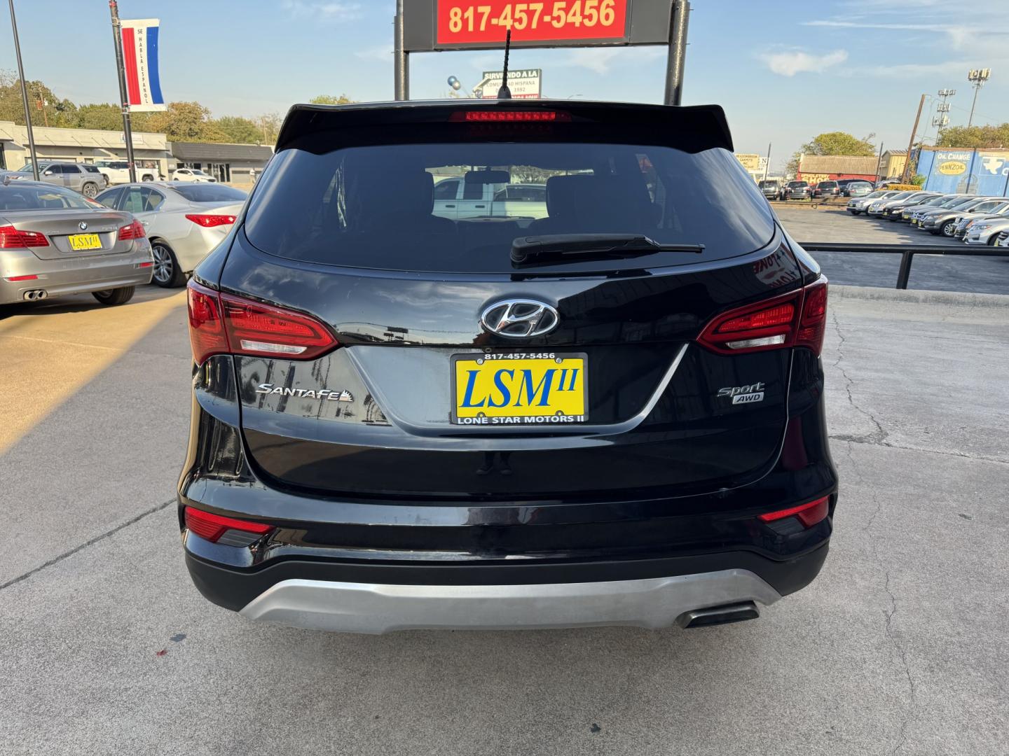 2018 BLACK HYUNDAI SANTA FE SPORT BASE (5NMZTDLB8JH) , located at 5900 E. Lancaster Ave., Fort Worth, TX, 76112, (817) 457-5456, 0.000000, 0.000000- Photo#4