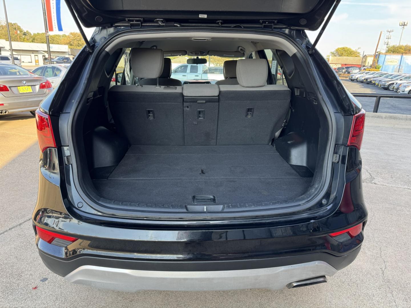 2018 BLACK HYUNDAI SANTA FE SPORT BASE (5NMZTDLB8JH) , located at 5900 E. Lancaster Ave., Fort Worth, TX, 76112, (817) 457-5456, 0.000000, 0.000000- Photo#5