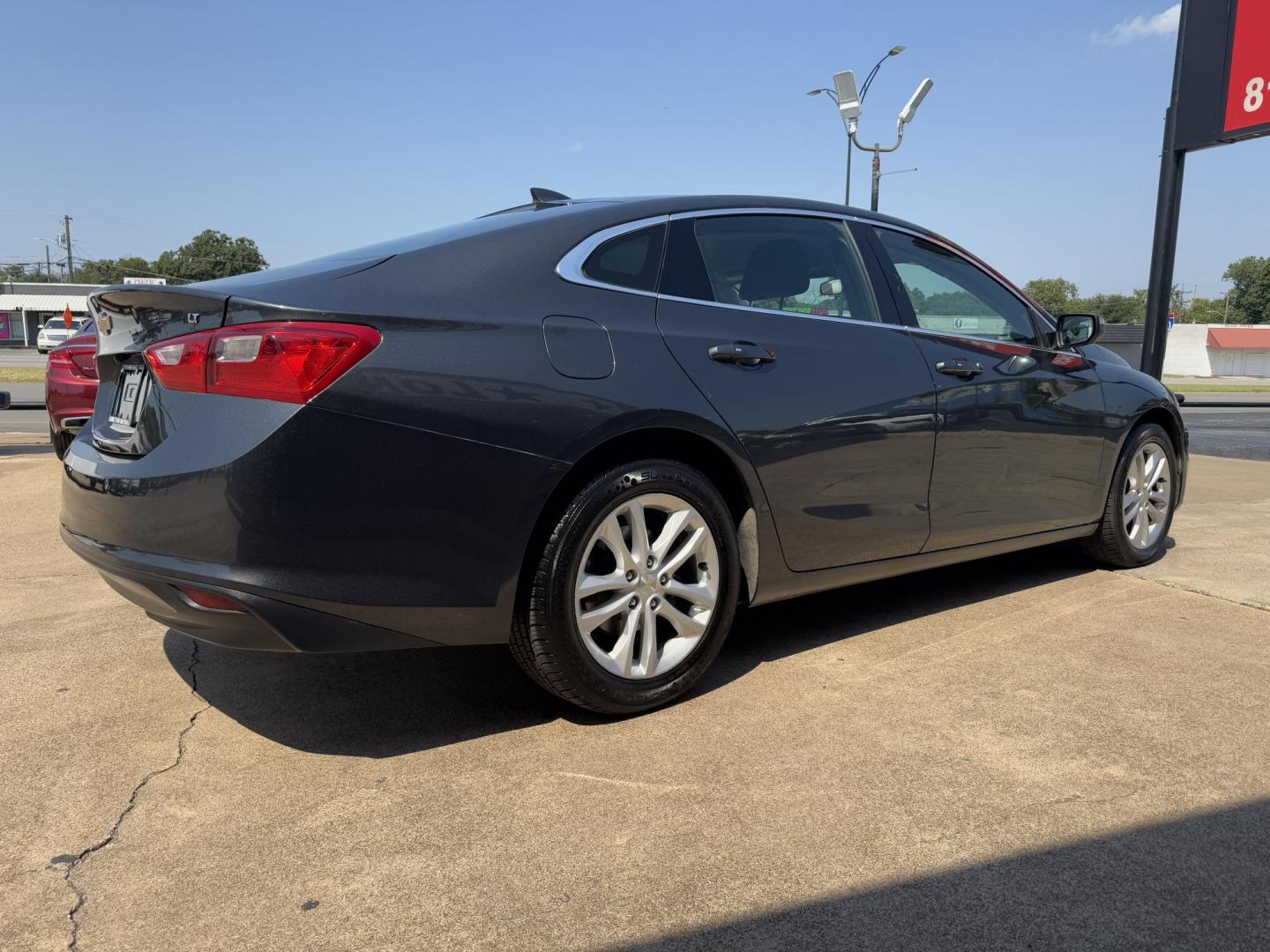 2016 GRAY /BLACK CHEVROLET MALIBU LT (1LT) 1LT (1G1ZE5ST1GF) with an 1.5L engine, 6-Speed Automatic transmission, located at 5900 E. Lancaster Ave., Fort Worth, TX, 76112, (817) 457-5456, 0.000000, 0.000000 - The 2016 Chevrolet Malibu 1LT is powered by a 1.5L 4-cylinder engine paired with a 6-speed automatic transmission and front-wheel drive, offering 27 MPG city and 37 MPG highway for excellent fuel efficiency. The sedan comfortably seats 5 passengers and features a well-designed interior for daily dri - Photo#3