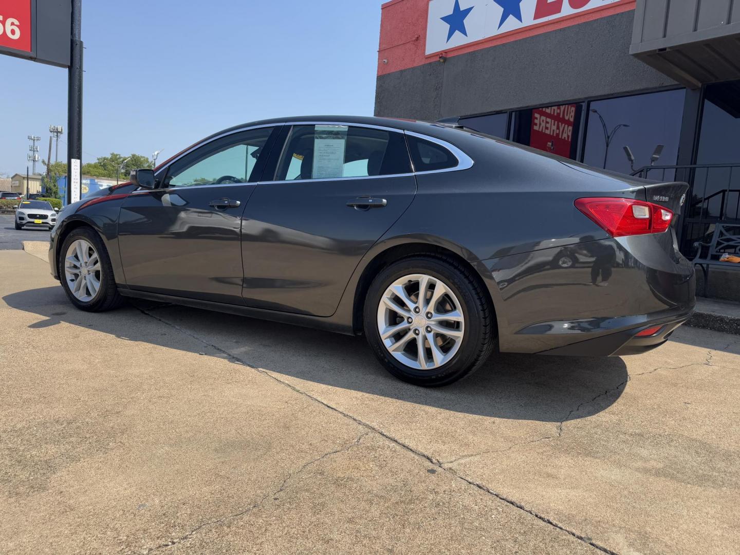 2016 GRAY /BLACK CHEVROLET MALIBU LT (1LT) 1LT (1G1ZE5ST1GF) with an 1.5L engine, 6-Speed Automatic transmission, located at 5900 E. Lancaster Ave., Fort Worth, TX, 76112, (817) 457-5456, 0.000000, 0.000000 - The 2016 Chevrolet Malibu 1LT is powered by a 1.5L 4-cylinder engine paired with a 6-speed automatic transmission and front-wheel drive, offering 27 MPG city and 37 MPG highway for excellent fuel efficiency. The sedan comfortably seats 5 passengers and features a well-designed interior for daily dri - Photo#6