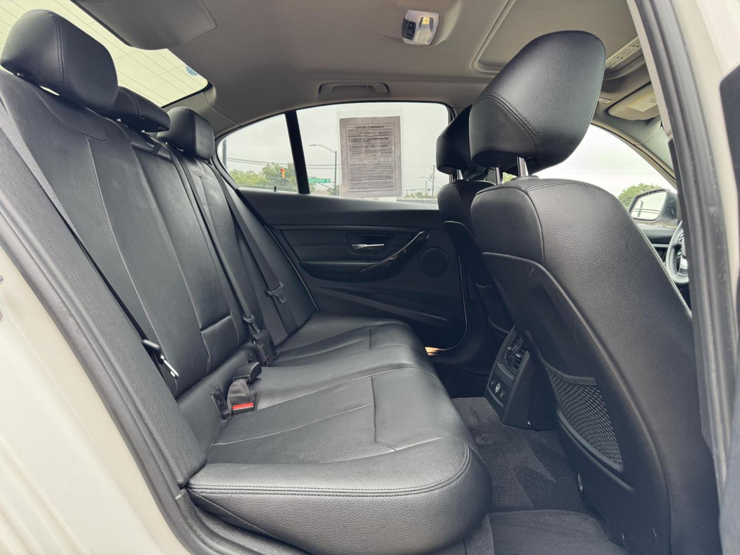 2015 WHITE /BLACK BMW 3 SERIES 328I XDRIVE 328i xDrive Sedan (WBA3B3G59FN) with an 2.0L L4 DOHC 16V engine, 8-Speed Automatic transmission, located at 5900 E. Lancaster Ave., Fort Worth, TX, 76112, (817) 457-5456, 0.000000, 0.000000 - 2015 BMW 328i xDrive Sedan – Used BMW for Sale in Fort Worth This 2015 BMW 328i xDrive Sedan is a pre-owned BMW with all-wheel drive, a 2.0L turbocharged engine, and 8-speed automatic transmission. Fully loaded with leather seats, heated front and rear seats, navigation touchscreen, power sunro - Photo#13