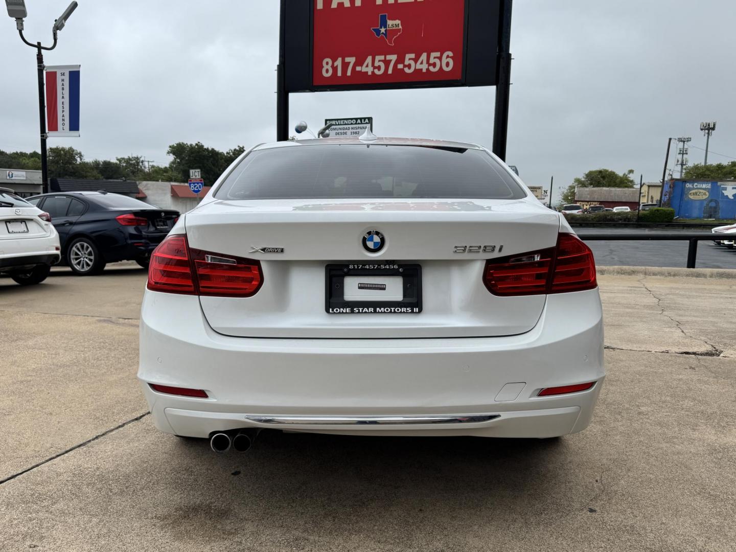 2015 WHITE /BLACK BMW 3 SERIES 328I XDRIVE 328i xDrive Sedan (WBA3B3G59FN) with an 2.0L L4 DOHC 16V engine, 8-Speed Automatic transmission, located at 5900 E. Lancaster Ave., Fort Worth, TX, 76112, (817) 457-5456, 0.000000, 0.000000 - 2015 BMW 328i xDrive Sedan – Used BMW for Sale in Fort Worth This 2015 BMW 328i xDrive Sedan is a pre-owned BMW with all-wheel drive, a 2.0L turbocharged engine, and 8-speed automatic transmission. Fully loaded with leather seats, heated front and rear seats, navigation touchscreen, power sunro - Photo#4