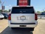 2016 WHITE /TAN CHEVROLET SUBURBAN LS LS 2WD (1GNSCGKC2GR) with an 5.3L V8 OHV 16V engine, 6-Speed Automatic transmission, located at 5900 E. Lancaster Ave., Fort Worth, TX, 76112, (817) 457-5456, 0.000000, 0.000000 - 2016 Chevrolet Suburban LS 2WD This full-size SUV has everything you need for family or work. Equipped with a 5.3L V8 engine, 6-speed automatic, and towing up to 8,300 lbs., it balances power with efficiency at 16/23 MPG. Inside, enjoy seating for 8 with a 3rd row, premium cloth power seats, and du - Photo#4