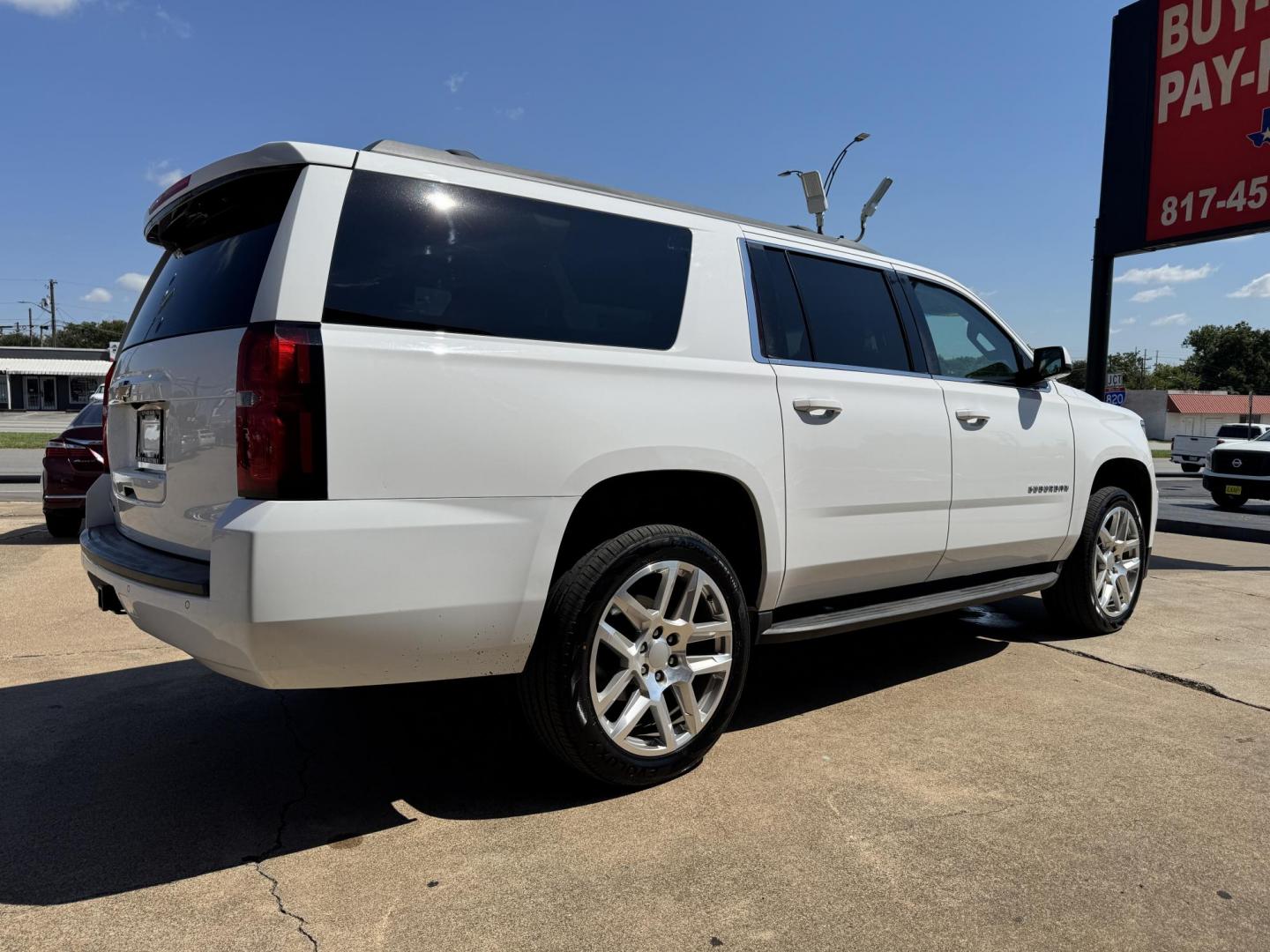 2016 WHITE /TAN CHEVROLET SUBURBAN LS LS 2WD (1GNSCGKC2GR) with an 5.3L V8 OHV 16V engine, 6-Speed Automatic transmission, located at 5900 E. Lancaster Ave., Fort Worth, TX, 76112, (817) 457-5456, 0.000000, 0.000000 - 2016 Chevrolet Suburban LS 2WD This full-size SUV has everything you need for family or work. Equipped with a 5.3L V8 engine, 6-speed automatic, and towing up to 8,300 lbs., it balances power with efficiency at 16/23 MPG. Inside, enjoy seating for 8 with a 3rd row, premium cloth power seats, and du - Photo#3