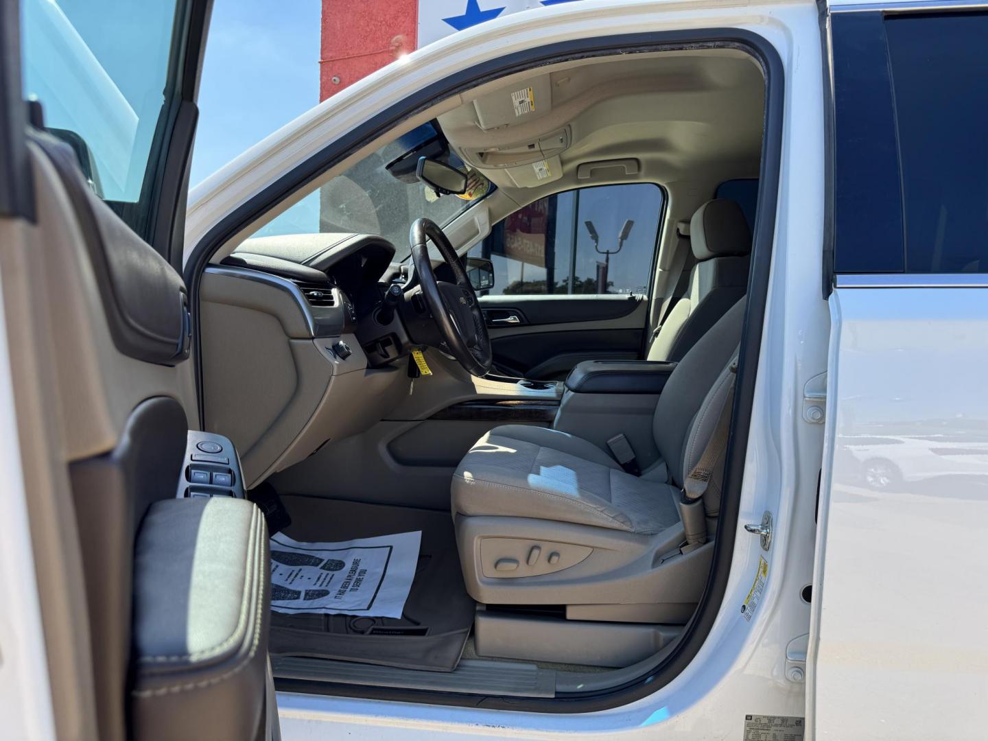 2016 WHITE /TAN CHEVROLET SUBURBAN LS LS 2WD (1GNSCGKC2GR) with an 5.3L V8 OHV 16V engine, 6-Speed Automatic transmission, located at 5900 E. Lancaster Ave., Fort Worth, TX, 76112, (817) 457-5456, 0.000000, 0.000000 - 2016 Chevrolet Suburban LS 2WD This full-size SUV has everything you need for family or work. Equipped with a 5.3L V8 engine, 6-speed automatic, and towing up to 8,300 lbs., it balances power with efficiency at 16/23 MPG. Inside, enjoy seating for 8 with a 3rd row, premium cloth power seats, and du - Photo#9
