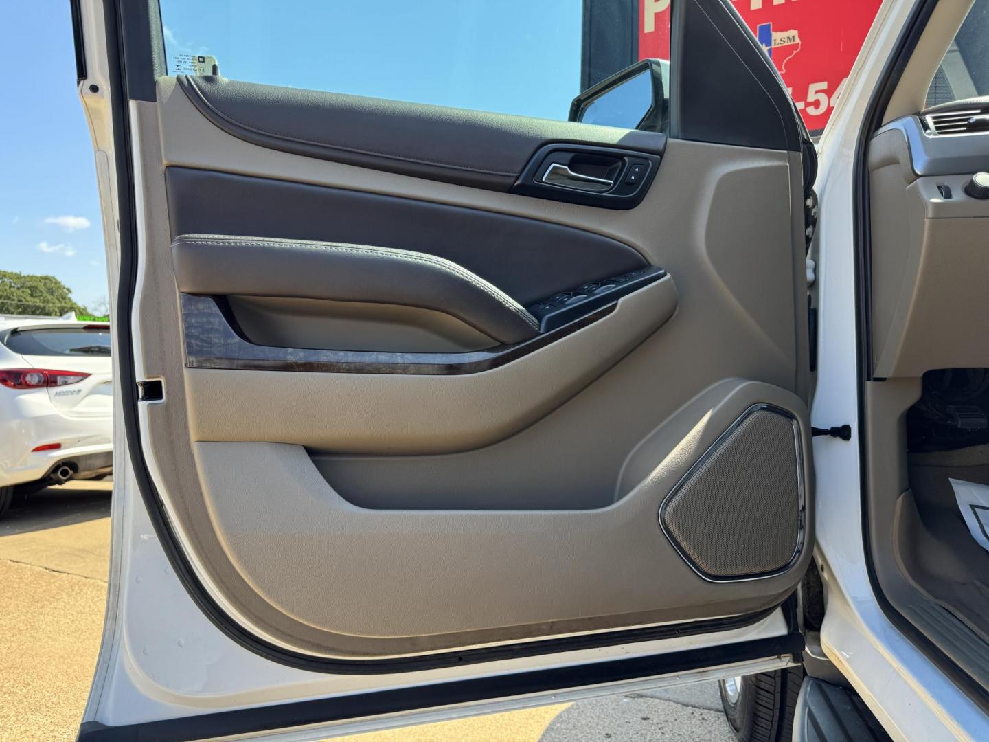 2016 WHITE /TAN CHEVROLET SUBURBAN LS LS 2WD (1GNSCGKC2GR) with an 5.3L V8 OHV 16V engine, 6-Speed Automatic transmission, located at 5900 E. Lancaster Ave., Fort Worth, TX, 76112, (817) 457-5456, 0.000000, 0.000000 - 2016 Chevrolet Suburban LS 2WD This full-size SUV has everything you need for family or work. Equipped with a 5.3L V8 engine, 6-speed automatic, and towing up to 8,300 lbs., it balances power with efficiency at 16/23 MPG. Inside, enjoy seating for 8 with a 3rd row, premium cloth power seats, and du - Photo#7