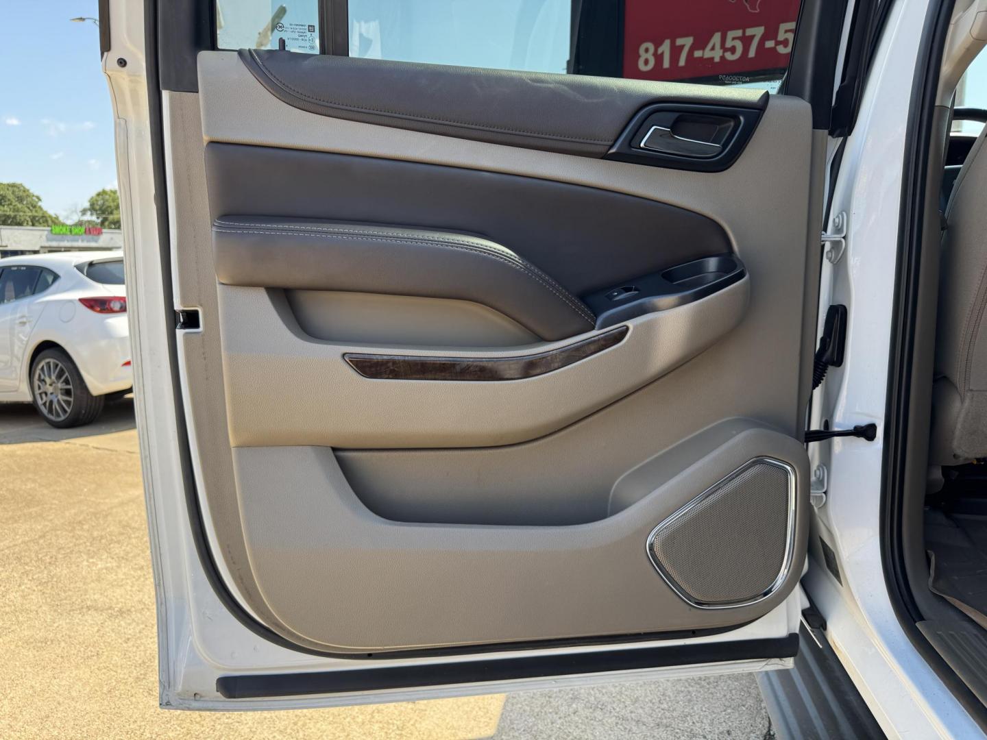 2016 WHITE /TAN CHEVROLET SUBURBAN LS LS 2WD (1GNSCGKC2GR) with an 5.3L V8 OHV 16V engine, 6-Speed Automatic transmission, located at 5900 E. Lancaster Ave., Fort Worth, TX, 76112, (817) 457-5456, 0.000000, 0.000000 - 2016 Chevrolet Suburban LS 2WD This full-size SUV has everything you need for family or work. Equipped with a 5.3L V8 engine, 6-speed automatic, and towing up to 8,300 lbs., it balances power with efficiency at 16/23 MPG. Inside, enjoy seating for 8 with a 3rd row, premium cloth power seats, and du - Photo#11