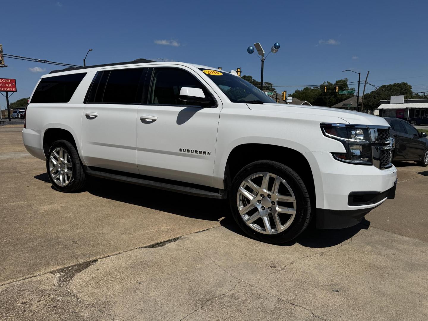 2016 WHITE /TAN CHEVROLET SUBURBAN LS LS 2WD (1GNSCGKC2GR) with an 5.3L V8 OHV 16V engine, 6-Speed Automatic transmission, located at 5900 E. Lancaster Ave., Fort Worth, TX, 76112, (817) 457-5456, 0.000000, 0.000000 - 2016 Chevrolet Suburban LS 2WD This full-size SUV has everything you need for family or work. Equipped with a 5.3L V8 engine, 6-speed automatic, and towing up to 8,300 lbs., it balances power with efficiency at 16/23 MPG. Inside, enjoy seating for 8 with a 3rd row, premium cloth power seats, and du - Photo#2