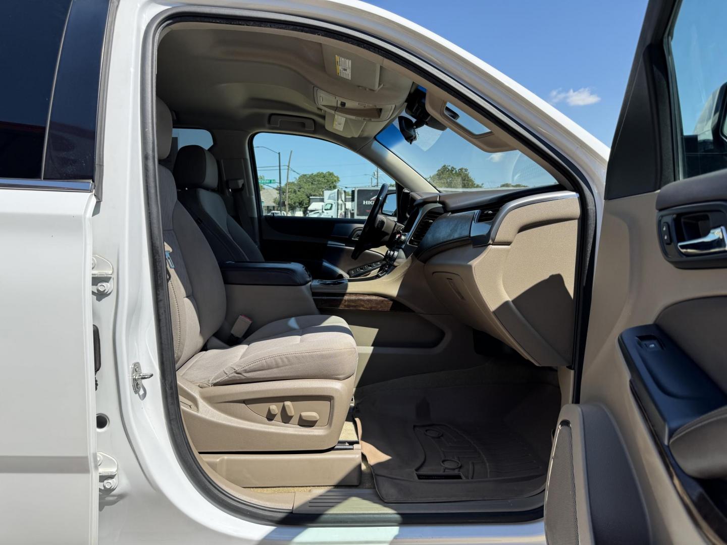 2016 WHITE /TAN CHEVROLET SUBURBAN LS LS 2WD (1GNSCGKC2GR) with an 5.3L V8 OHV 16V engine, 6-Speed Automatic transmission, located at 5900 E. Lancaster Ave., Fort Worth, TX, 76112, (817) 457-5456, 0.000000, 0.000000 - 2016 Chevrolet Suburban LS 2WD This full-size SUV has everything you need for family or work. Equipped with a 5.3L V8 engine, 6-speed automatic, and towing up to 8,300 lbs., it balances power with efficiency at 16/23 MPG. Inside, enjoy seating for 8 with a 3rd row, premium cloth power seats, and du - Photo#19