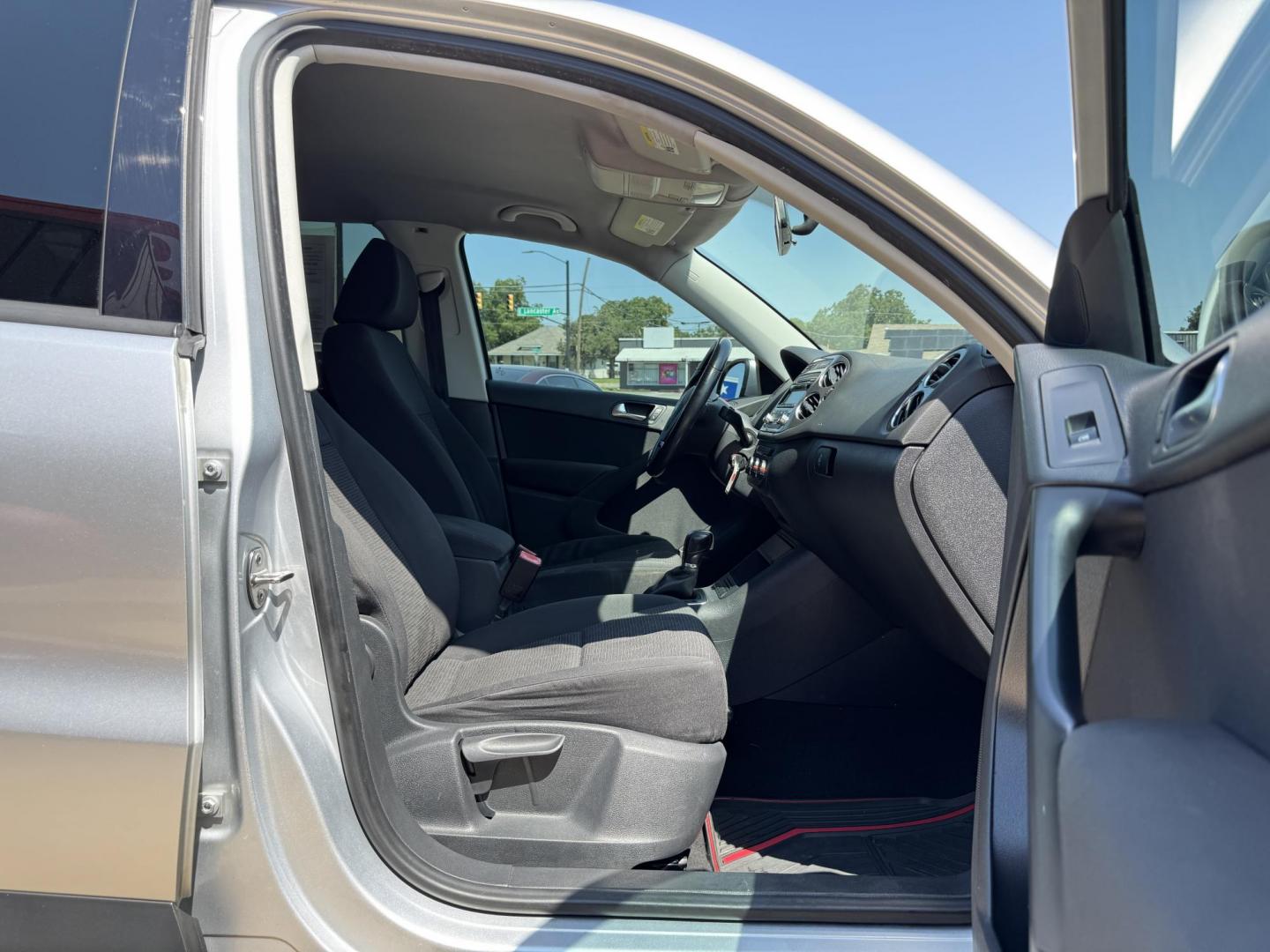 2014 SILVER /BLACK VOLKSWAGEN TIGUAN S; SE; SEL; W S (WVGAV3AX2EW) with an 2.0L Turbocharged 4-Cylinder engine, 6-Speed Automatic transmission, located at 5900 E. Lancaster Ave., Fort Worth, TX, 76112, (817) 457-5456, 0.000000, 0.000000 - Sporty and versatile, this Tiguan features a 2.0L turbocharged engine, seating for 5 passengers, and up to 23.8 cu. ft. of cargo space. Enjoy features like black cloth interior, power locks, ABS, and stability control—a compact SUV with German engineering, efficiency, and comfort all in one. - Photo#15