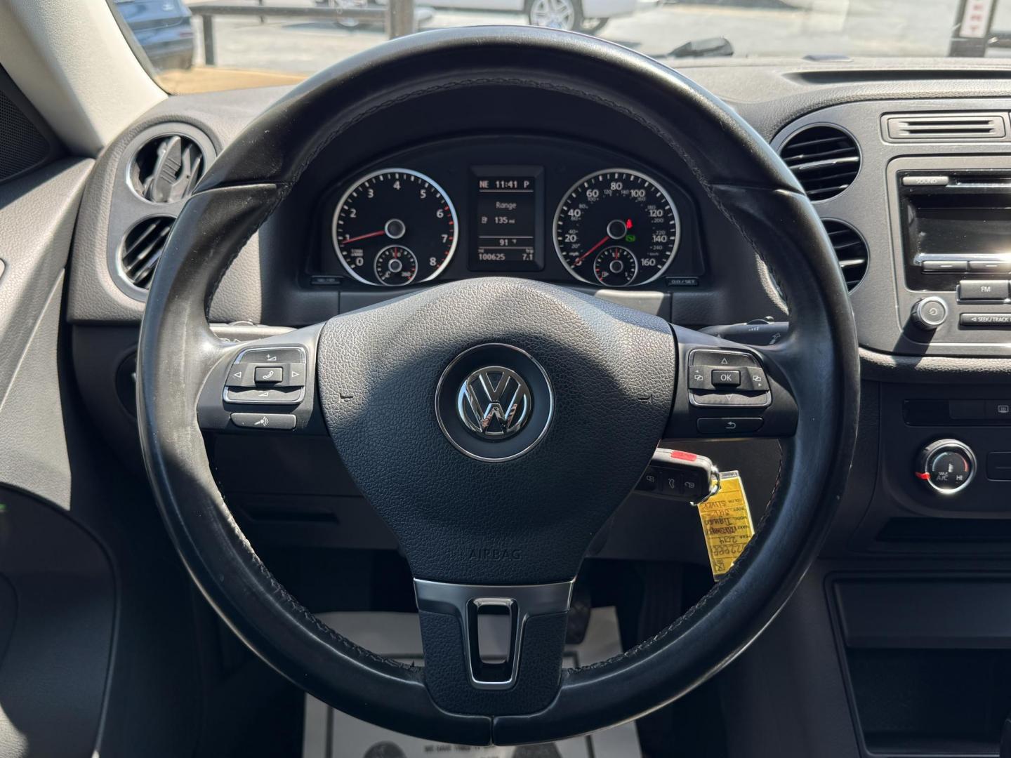 2014 SILVER /BLACK VOLKSWAGEN TIGUAN S; SE; SEL; W S (WVGAV3AX2EW) with an 2.0L Turbocharged 4-Cylinder engine, 6-Speed Automatic transmission, located at 5900 E. Lancaster Ave., Fort Worth, TX, 76112, (817) 457-5456, 0.000000, 0.000000 - Sporty and versatile, this Tiguan features a 2.0L turbocharged engine, seating for 5 passengers, and up to 23.8 cu. ft. of cargo space. Enjoy features like black cloth interior, power locks, ABS, and stability control—a compact SUV with German engineering, efficiency, and comfort all in one. - Photo#18