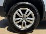 2014 SILVER /BLACK VOLKSWAGEN TIGUAN S; SE; SEL; W S (WVGAV3AX2EW) with an 2.0L Turbocharged 4-Cylinder engine, 6-Speed Automatic transmission, located at 5900 E. Lancaster Ave., Fort Worth, TX, 76112, (817) 457-5456, 0.000000, 0.000000 - Sporty and versatile, this Tiguan features a 2.0L turbocharged engine, seating for 5 passengers, and up to 23.8 cu. ft. of cargo space. Enjoy features like black cloth interior, power locks, ABS, and stability control—a compact SUV with German engineering, efficiency, and comfort all in one. - Photo#20