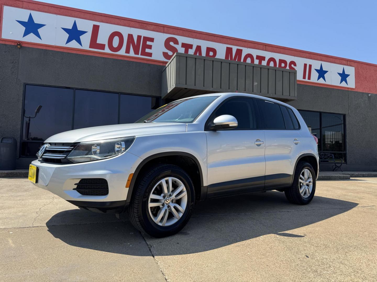 2014 SILVER /BLACK VOLKSWAGEN TIGUAN S; SE; SEL; W S (WVGAV3AX2EW) with an 2.0L Turbocharged 4-Cylinder engine, 6-Speed Automatic transmission, located at 5900 E. Lancaster Ave., Fort Worth, TX, 76112, (817) 457-5456, 0.000000, 0.000000 - Sporty and versatile, this Tiguan features a 2.0L turbocharged engine, seating for 5 passengers, and up to 23.8 cu. ft. of cargo space. Enjoy features like black cloth interior, power locks, ABS, and stability control—a compact SUV with German engineering, efficiency, and comfort all in one. - Photo#0