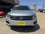 2014 SILVER /BLACK VOLKSWAGEN TIGUAN S; SE; SEL; W S (WVGAV3AX2EW) with an 2.0L Turbocharged 4-Cylinder engine, 6-Speed Automatic transmission, located at 5900 E. Lancaster Ave., Fort Worth, TX, 76112, (817) 457-5456, 0.000000, 0.000000 - Sporty and versatile, this Tiguan features a 2.0L turbocharged engine, seating for 5 passengers, and up to 23.8 cu. ft. of cargo space. Enjoy features like black cloth interior, power locks, ABS, and stability control—a compact SUV with German engineering, efficiency, and comfort all in one. - Photo#1